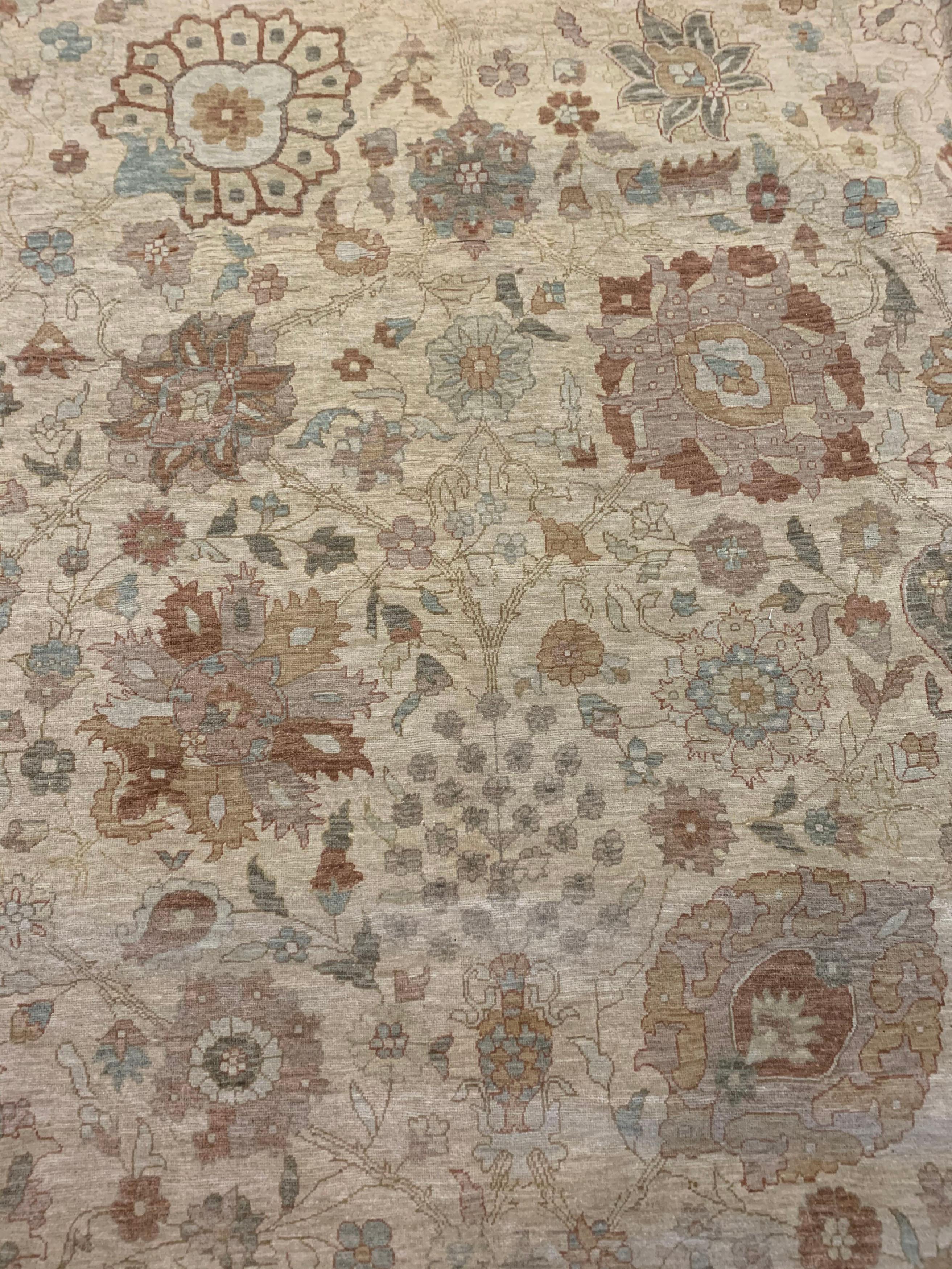 Tabriz Design Oversize Rug 13' x 23'9. A classic recreation of an antique Persian Tabriz design hand knotted in Egypt using the finest of materials. Colors: cream/dark & light taupe/blues/teals/soft green.