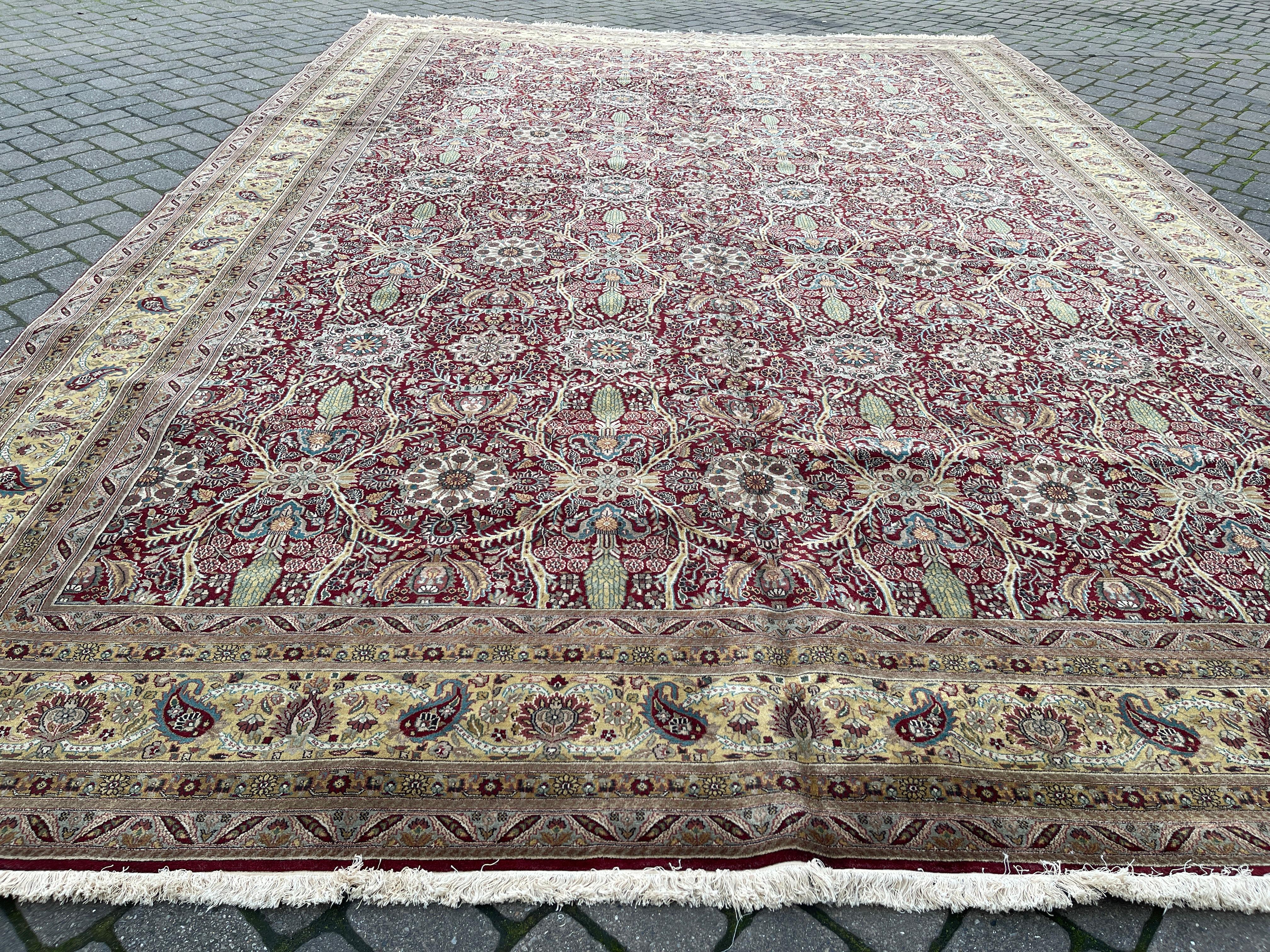 This Indian rug features a reds floral design  allowing you to switch up your decor. Add a touch of style to any room while also having the option to change things up to suit your mood. Beautiful and versatile, this rug is a must-have for any home.