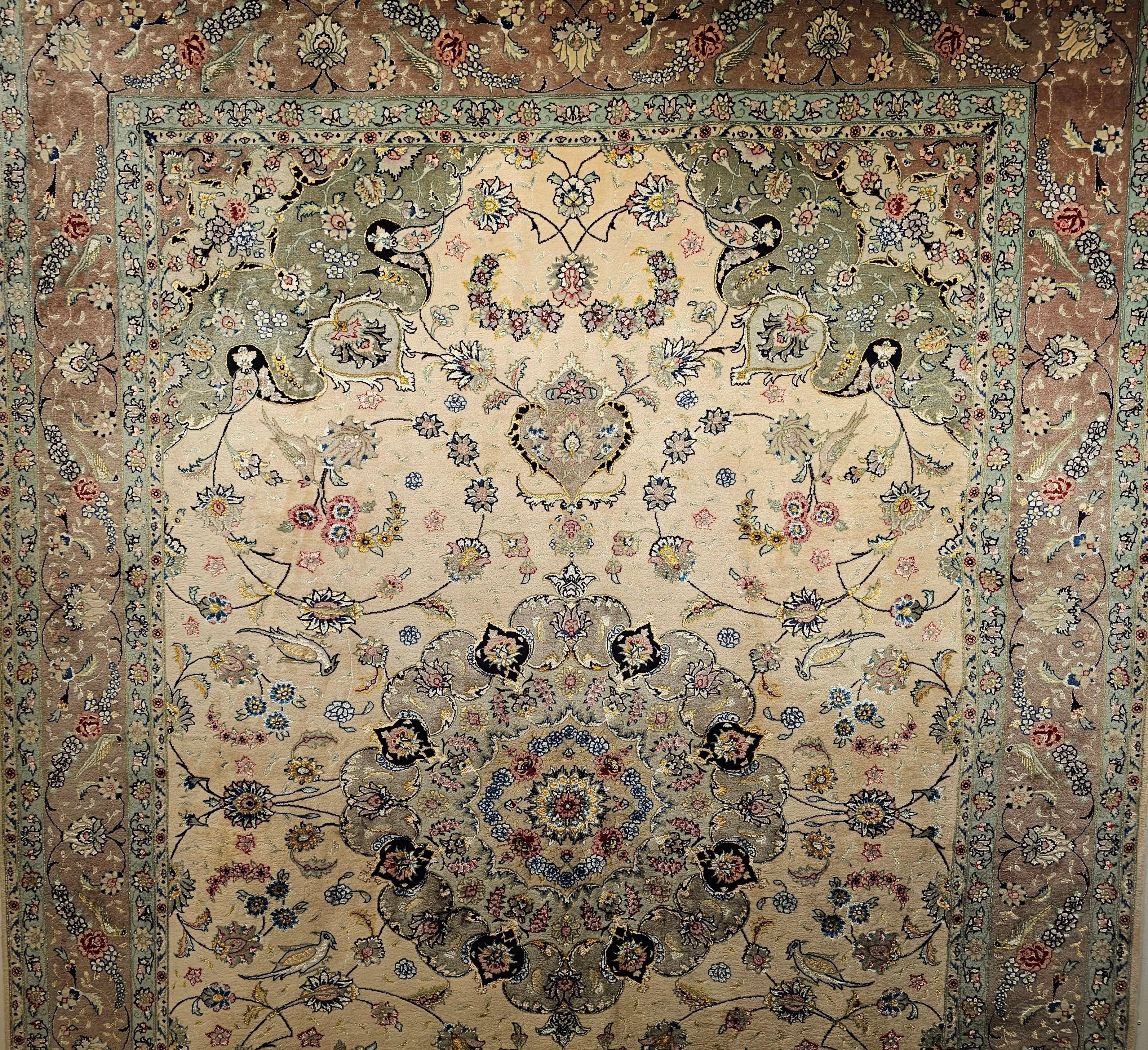 A very fine weave vintage Persian Tabriz room size rug in a floral design with silk highlights in ivory, taupe, and sage green colors from the 4th quarter of the 1900s.  The beautiful Tabriz rug  was very finely woven in a renowned workshop known