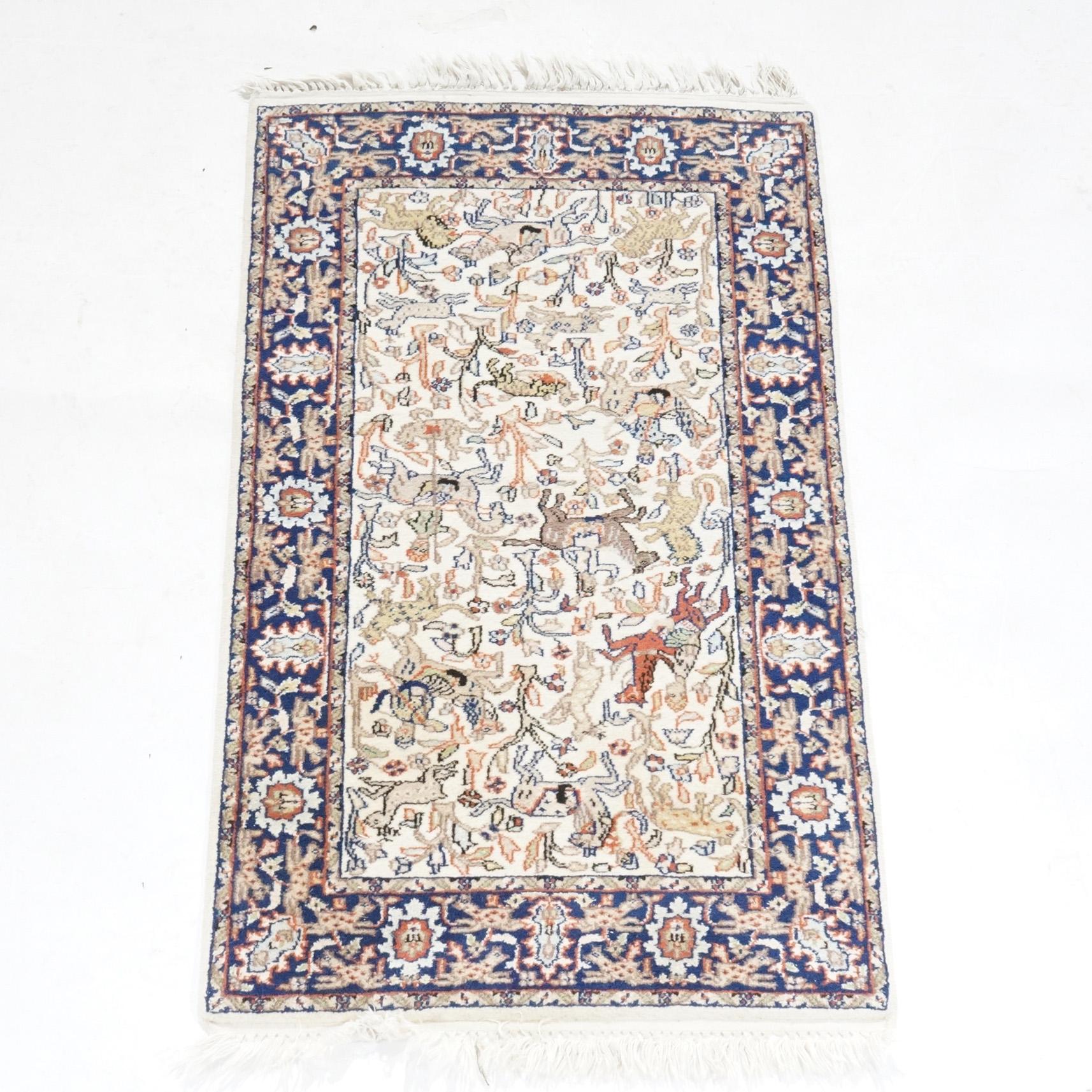A Tabriz Oriental Wool Hunt Rug with Figures & Animals, 20th century.

Measures - 54