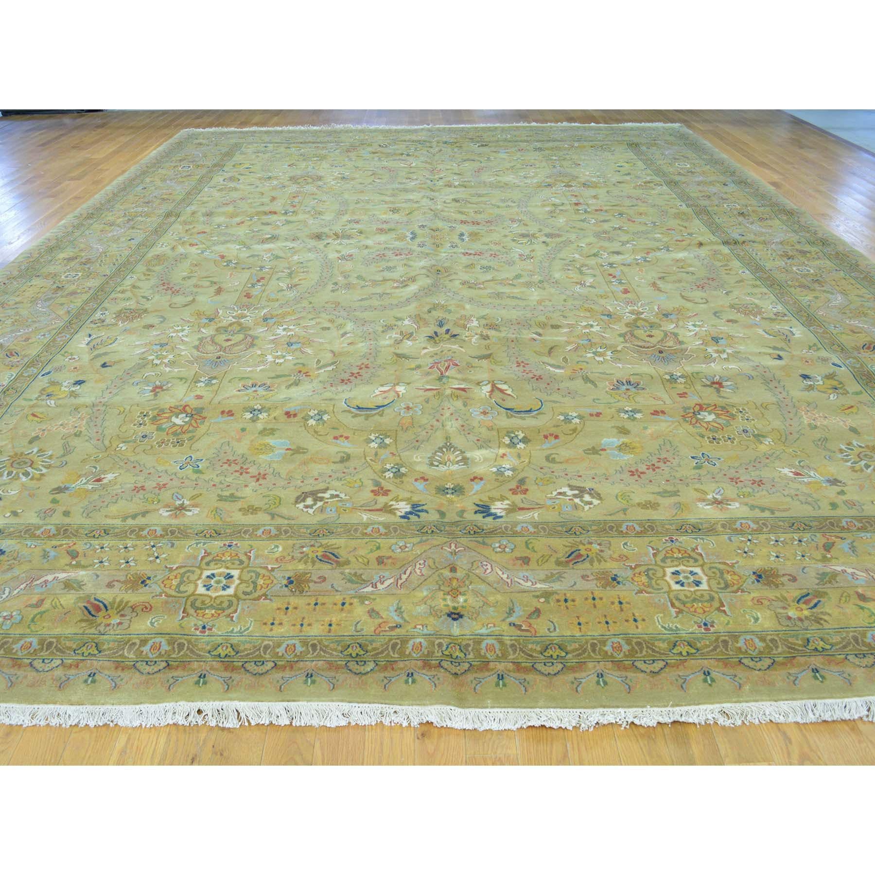 Tabriz Revival 300 KPSI oversize hand knotted Oriental rug. Measures: 11'8