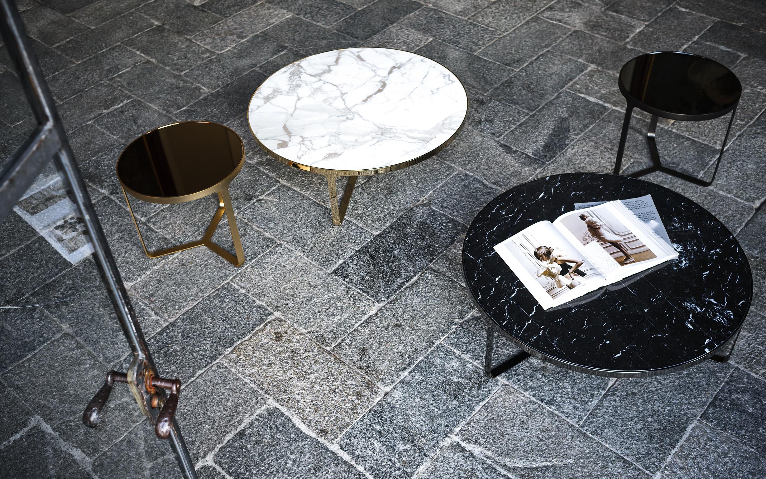 Minimalism and elegance are the key features of Cage coffee tables, with their metal base that is both support and frame for the precious marble top. Cage tables can be round or square, high or low, and they accompany and complement all the sofas