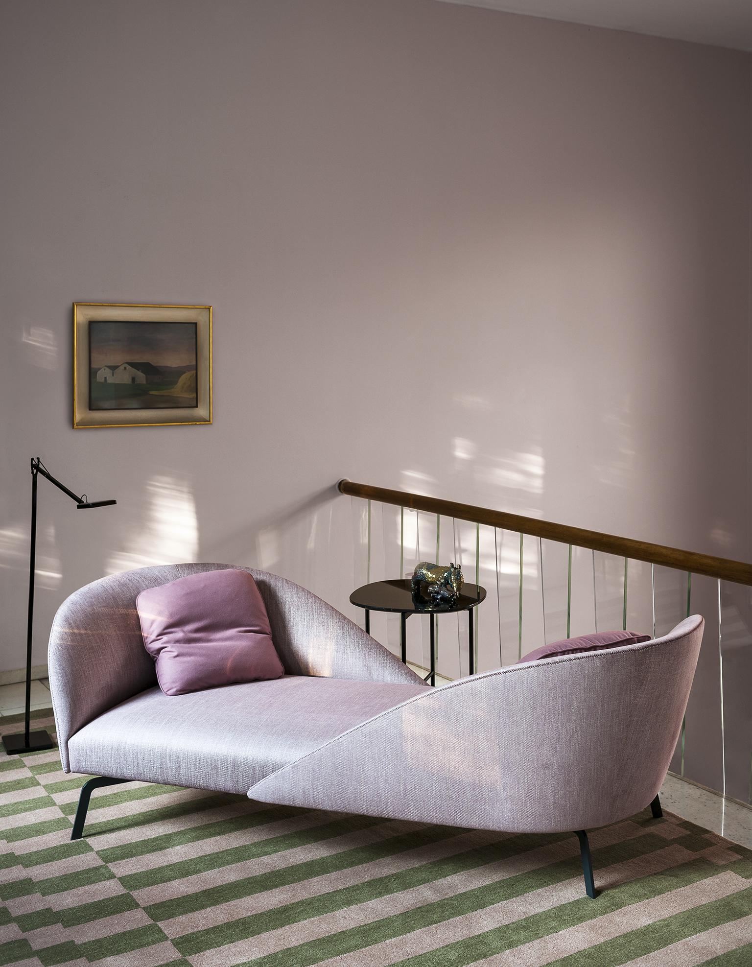 Face to Face is an original reinterpretation of the sofa as a space for one-to-one relations, with two opposing backs and soft, feather cushions inviting people to sit vis-à-vis. With its light, classical style, Face to Face is conceived to take a