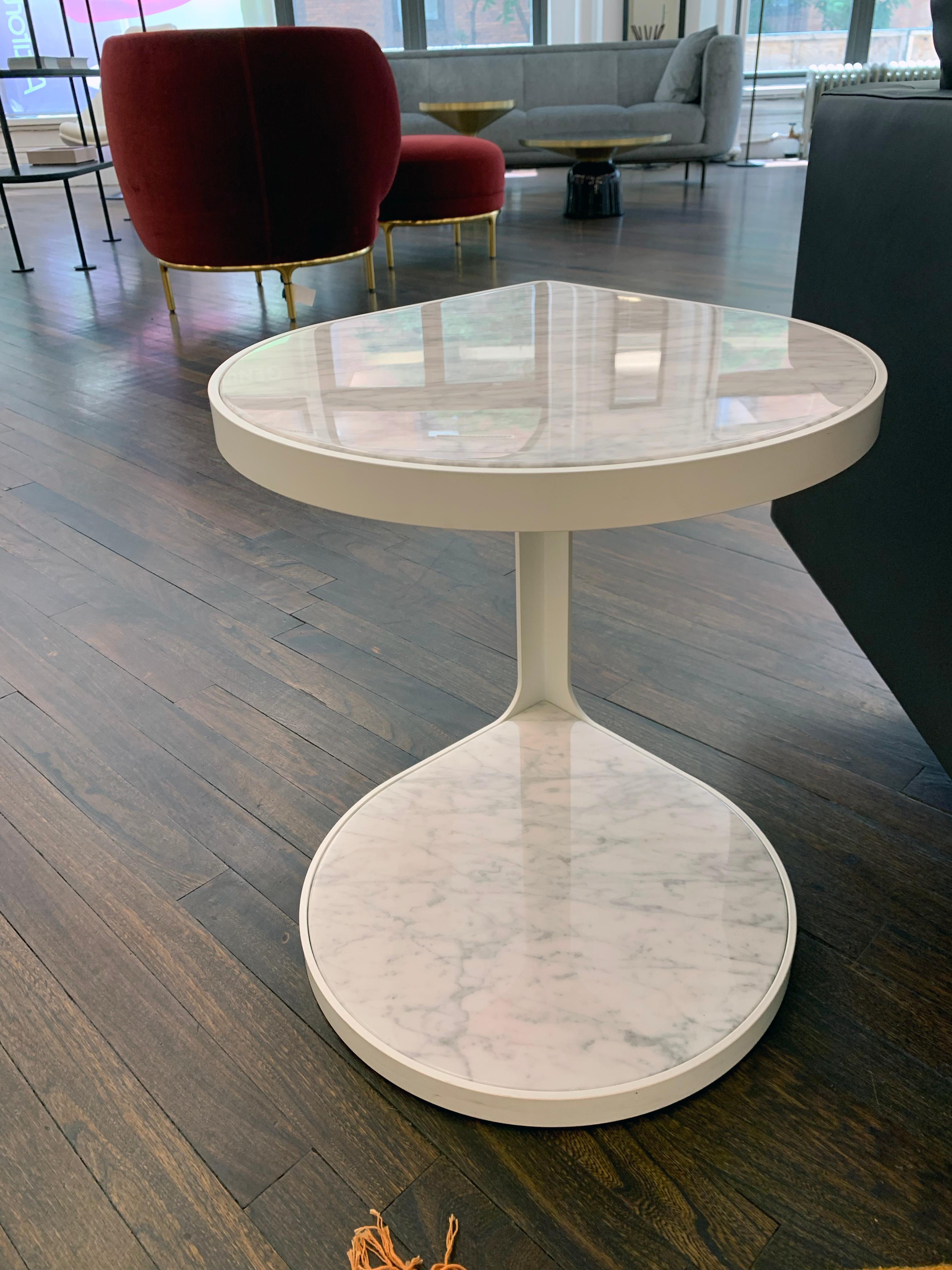 Nature’s shapes represent a major source of inspiration for designer Gordon Guillaumier. The top of the Coot table was inspired by the simple geometry of a petal; it is a perfect motif for generating a variety of different models from one single