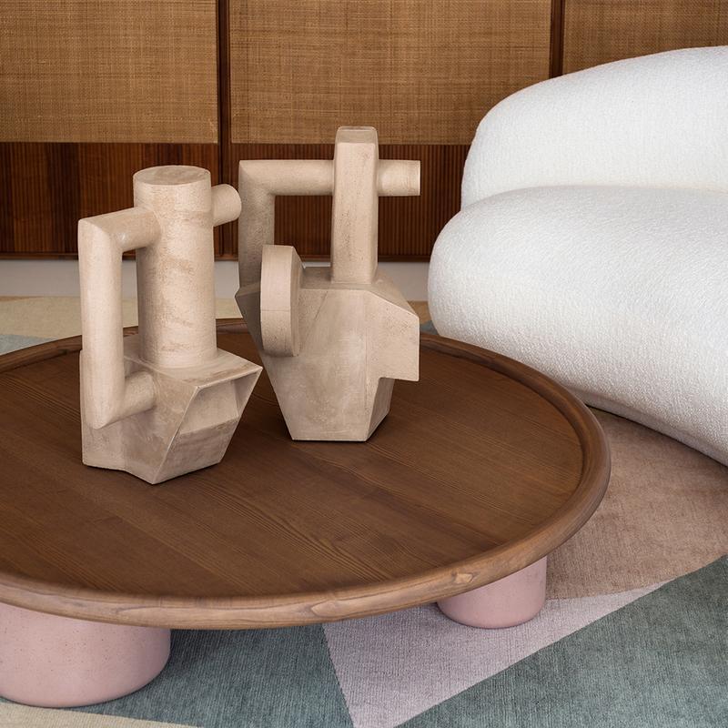 The cubist Pablo and Dora vases are a tribute to Pablo Picasso and Dora Maar, his companion and muse. Crafted using the coil pottery technique, the brown engobed stoneware vases are in the form of overlapping geometric shapes that create an effect
