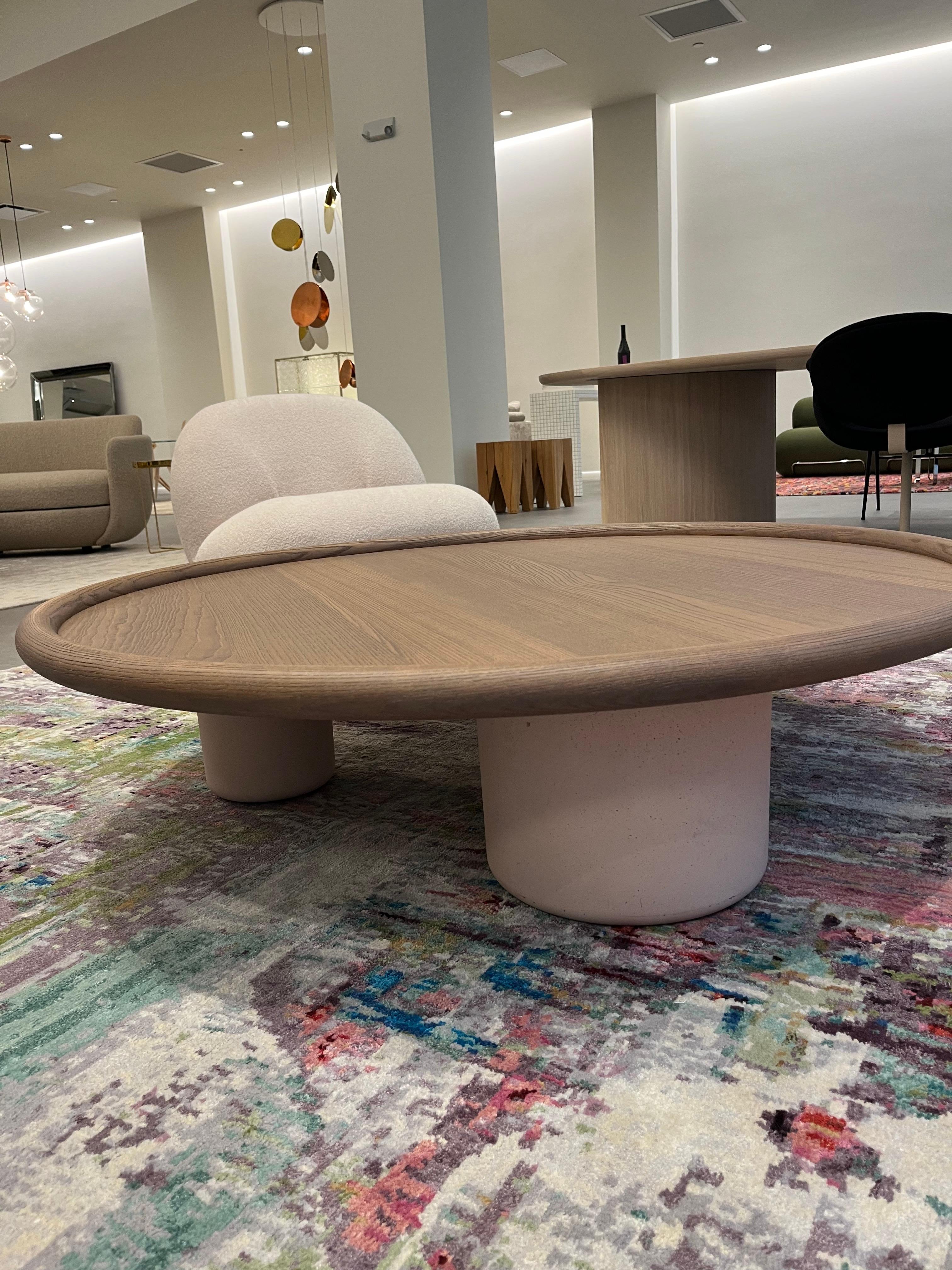IN STOCK -  
TOP WALNUT T134 
BASE Pink Cement 
Designed by Studiopepe, the Pluto coffee tables are essentially sculptural shapes and bold details that call to mind cubism. Available in two sizes, the coffee tables comprise a solid wood tabletop