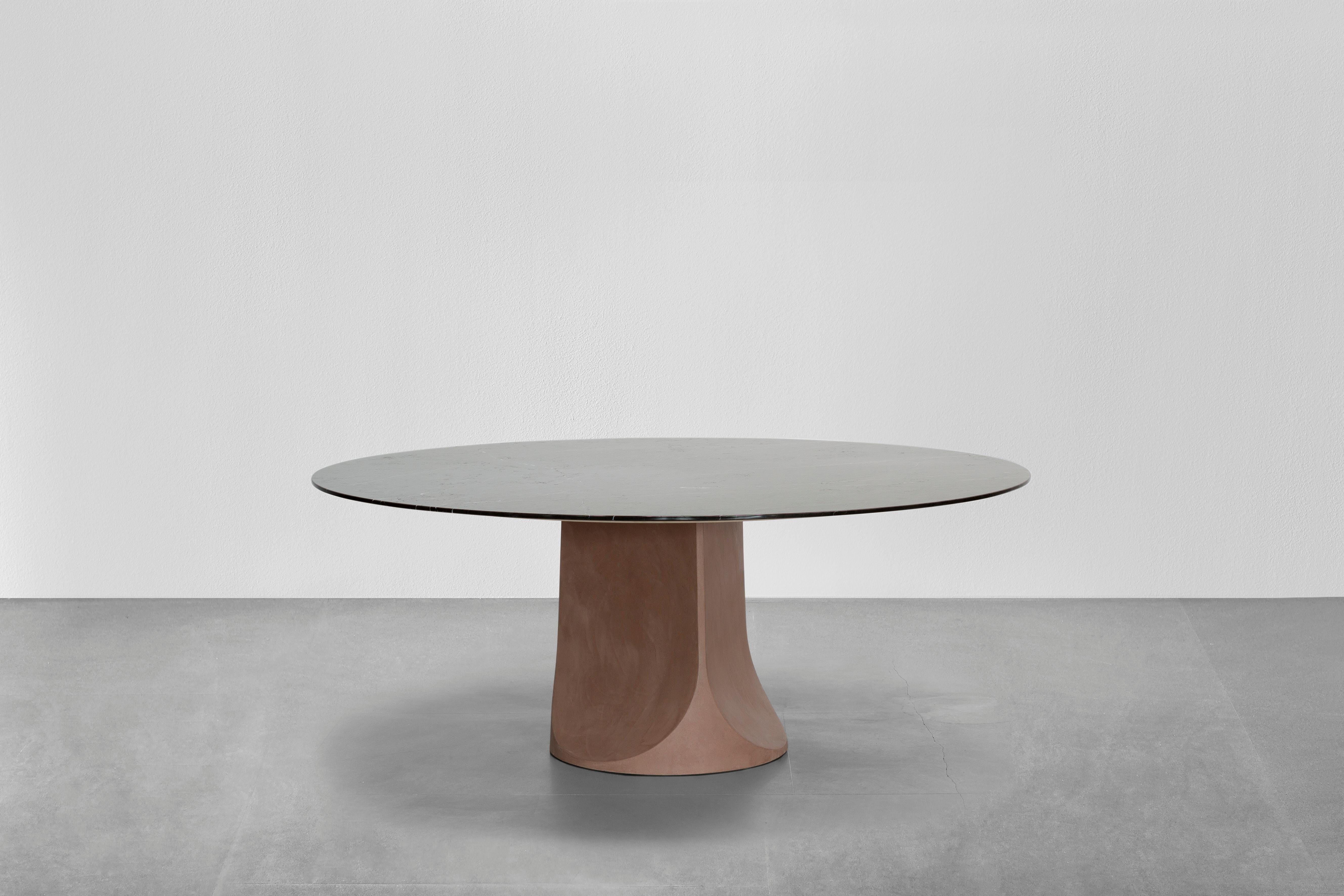 Togrul is a table with a round top made of marble.? A totem that transforms any room into a temple of conviviality.? With Togrul, designer Gordon Guillaumier goes beyond the limits of matter to create a table suitable for homes and contract spaces