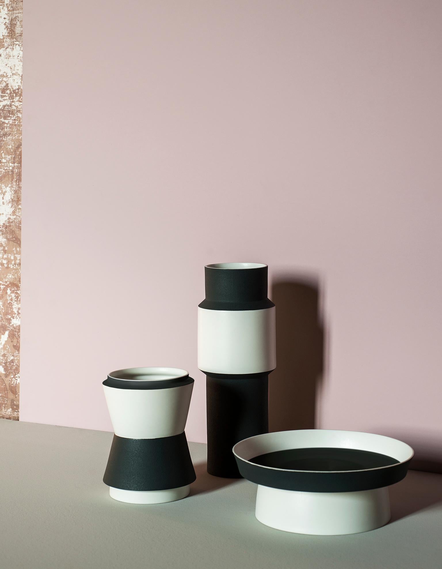 A shape and a material that represent classical, almost primordial elements of design objects: the porcelain pot. Maria Gabriella Zecca’s Vasum design arose by developing and overlaying elementary geometrical shapes: each portion features a colour,