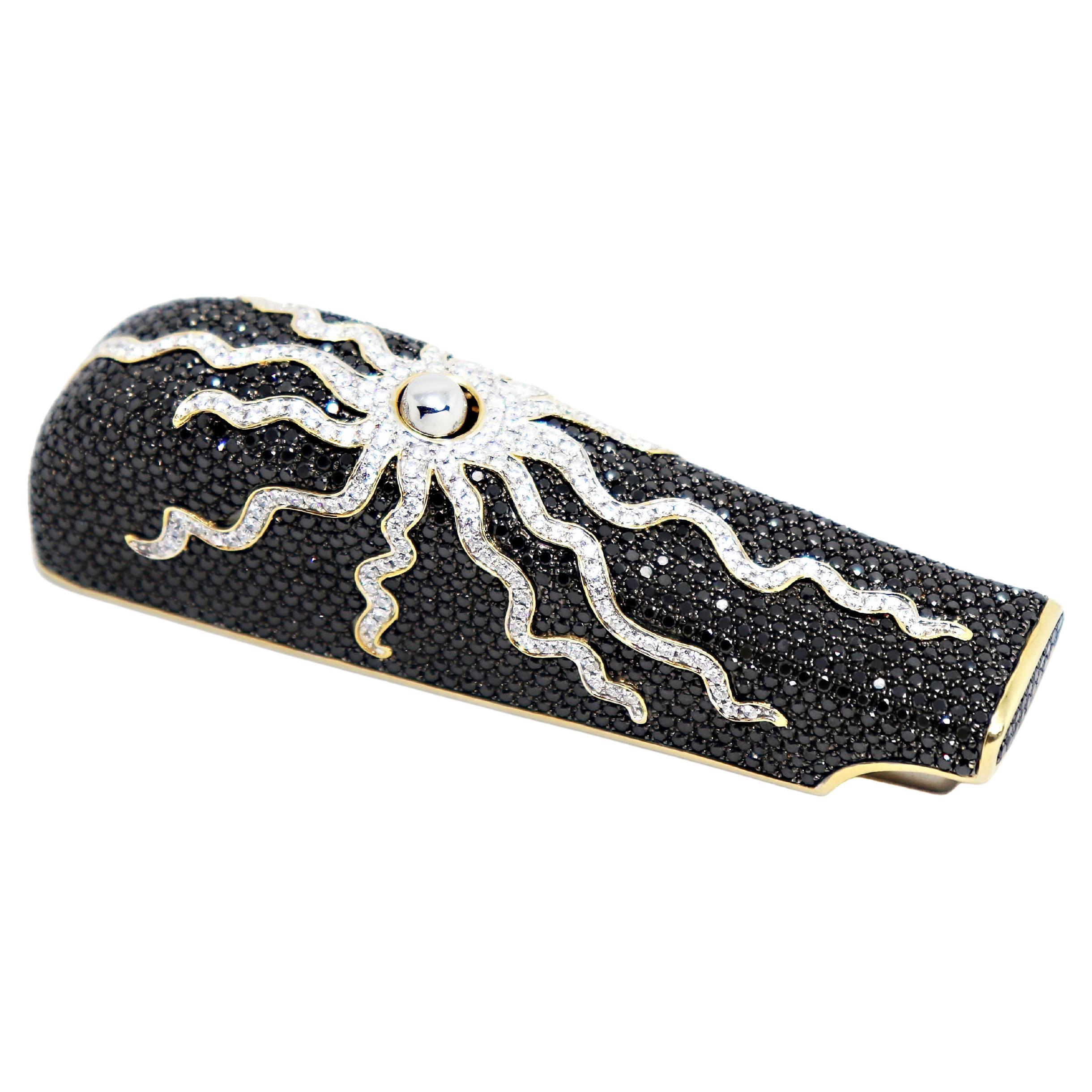 This limited edition accessory is designed to keep your handbag safe, clean and close to you! Made by TACH, this incredible handbag holder is beautifully handcrafted in 18 carat gold (hallmarked), and inlaid with approximately 16.00 carats of fine