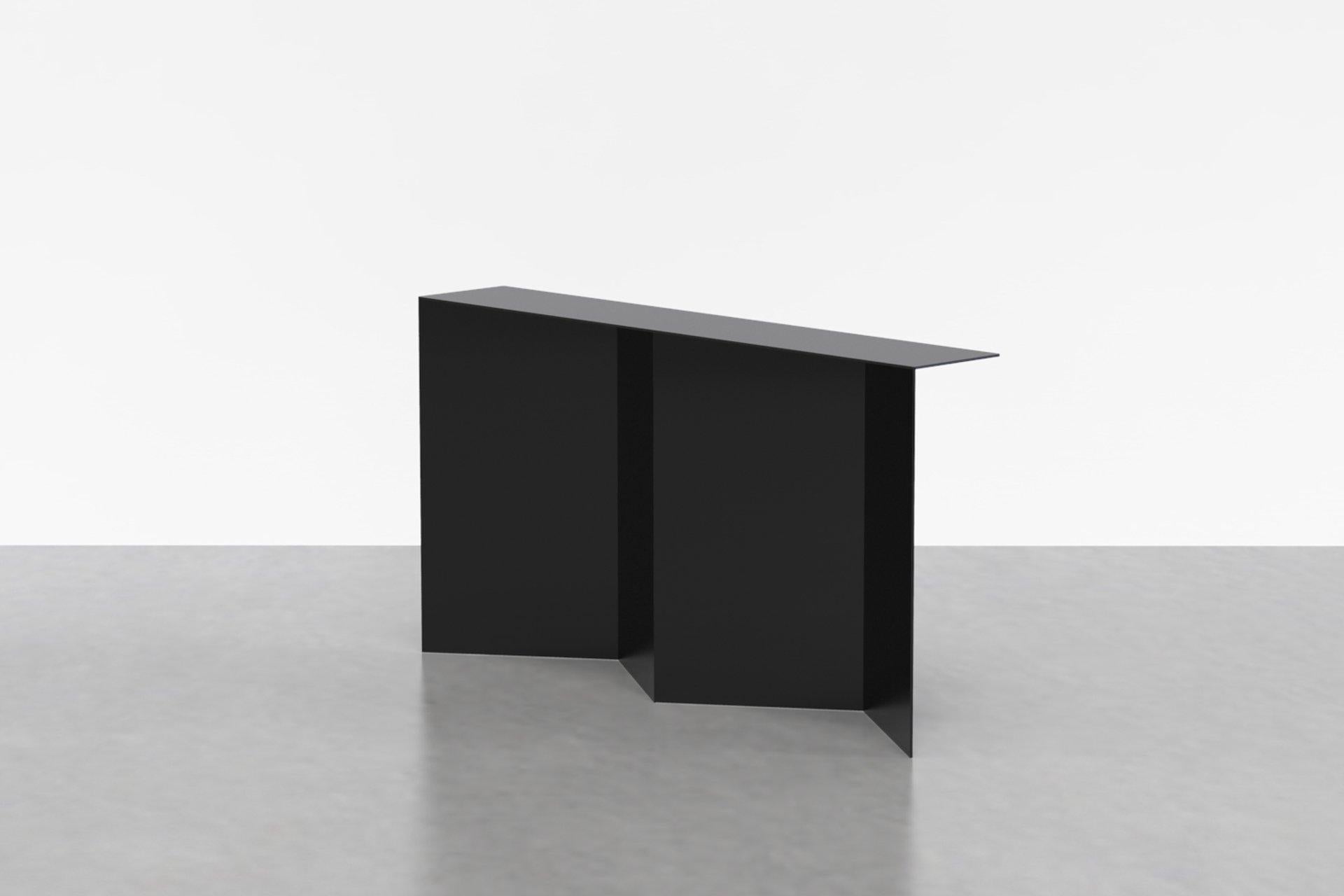 The tack console explores the nuances of minimal planes, angles, and intersections. Made from powder-coated aluminum that is seamlessly welded together, the Tack console is an elegant sculptural addition to any lobby, foyer, or hallway. Available in