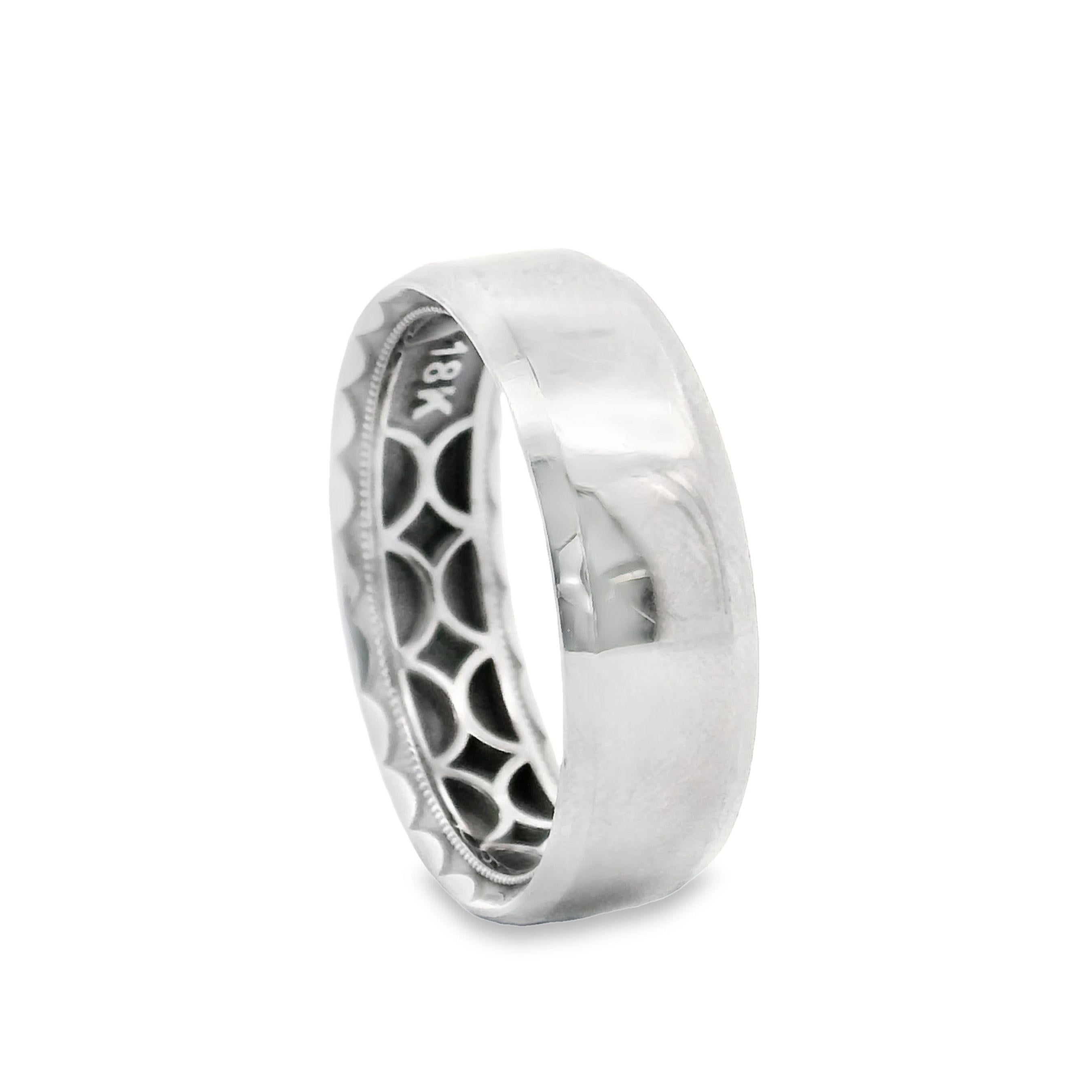 Tacori 107-7W men's wedding band in 18K white gold and 7 millimeters in width.  This ring has a high polish finish and 