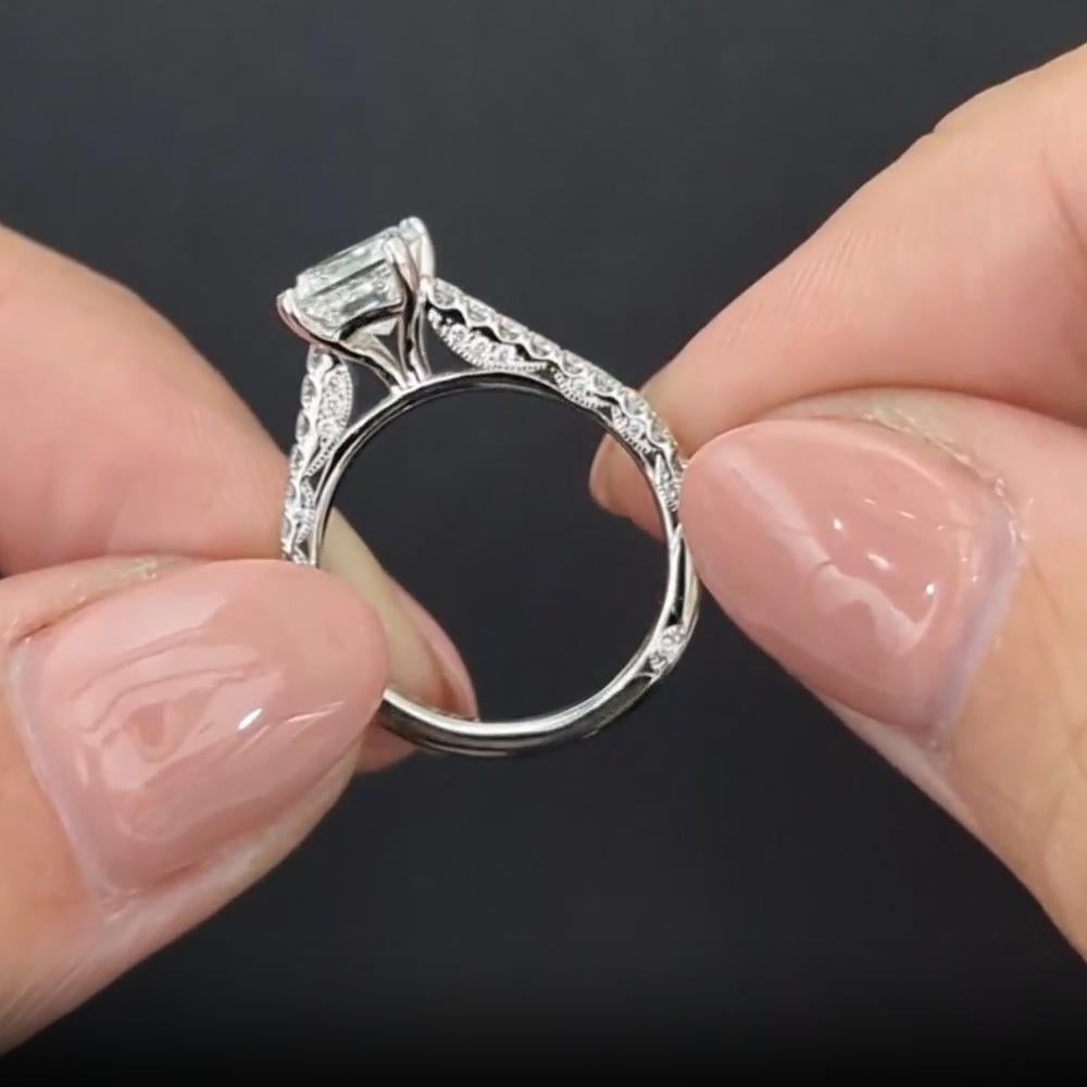 This exquisite Tacori engagement ring showcases a breathtaking 1.22-carat princess-cut diamond, set in a luxurious platinum band. With its F-G color and VS1 clarity, this ring embodies brilliance, elegance, and timeless craftsmanship, making it a