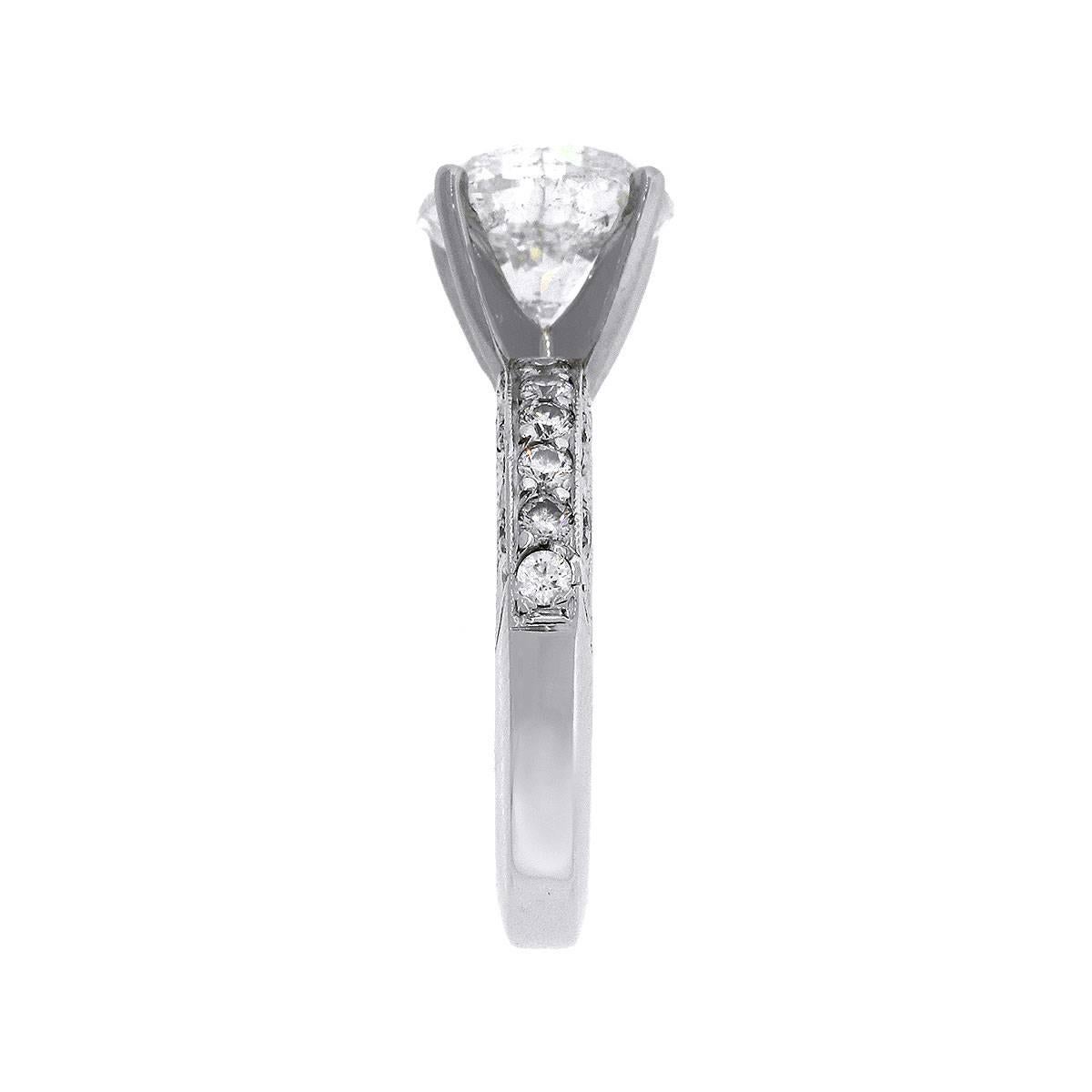 Material: Platinum
Diamond Details: Approximately 3.66ct round brilliant diamond. G/H in color and I1 in clarity
Side Diamond Details: Approximately 0.35ctw of round diamonds in Tacori setting. F in color VS in clarity.
Size: 6
Total Weight: 8.7g