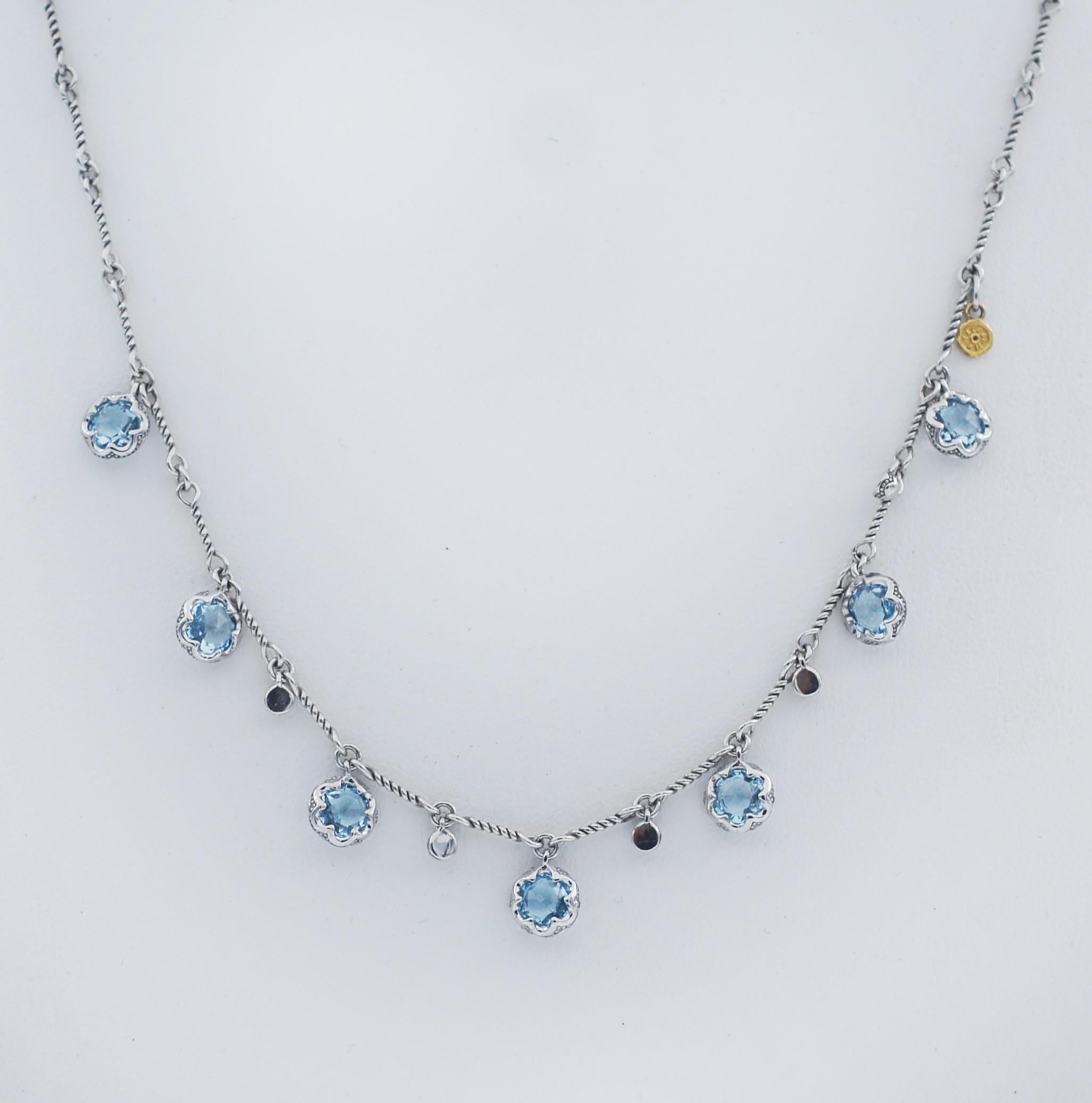 TACORI
925 Silver / 18K
Sonoma Skies
Multi-Gem Drop Necklace featuring Sky Blue Topaz
STYLE SN20502
drops of Sky Blue Topaz gemstones that are encased within crescent outlined silver baskets delicately cascade down your neck. Delicate twists of