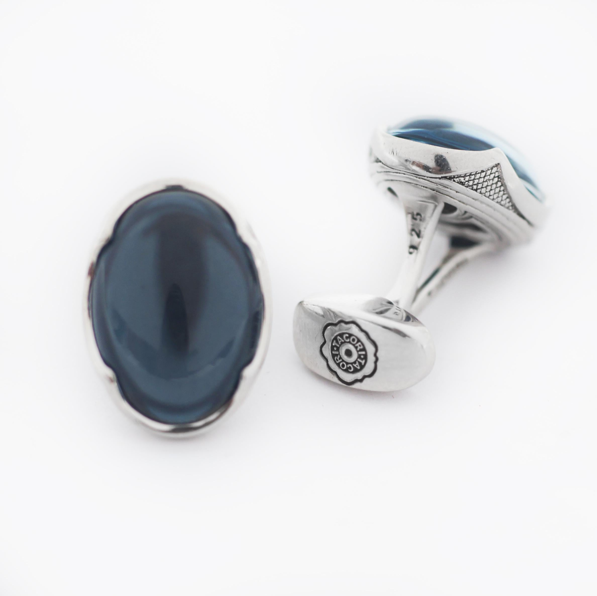 TACORI
925 Silver
Retro Classic
Oval Cabochon Cuff Links
featuring:
Oval Sky Blue Topaz over Hematite gemstone cuff links cradled in a silver signature Tacori crescent cut. This piece adds a sophisticated finish to your shirt cuffs and an unexpected