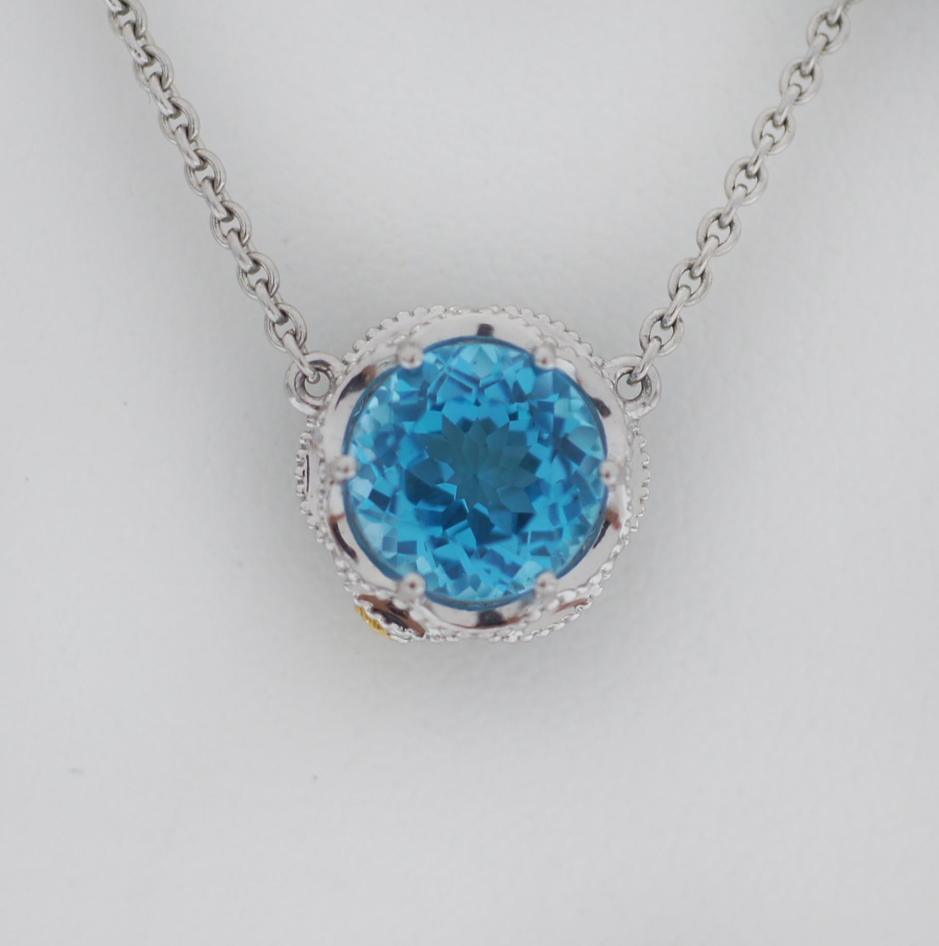 Tacori
This multifaceted Swiss Blue Topaz gemstone pendant will sparkle with every beat of your heart. The gemstone is encased within a silver basket with Milgrain detailing and shines like a true beauty.
925 Sterling Silver
18K Gold 
Pendant