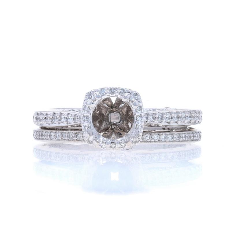 Retail Price: $6980

Size: 5 1/2
Sizing Fee: Up 1 1/2 sizes for $80 or Down 1/2 a size for $60

Brand: Tacori
Collection: Dantela

Metal Content: 18k White Gold

Stone Information

Natural Diamonds
Carat(s): .24ctw
Cut: Round Brilliant
Color: