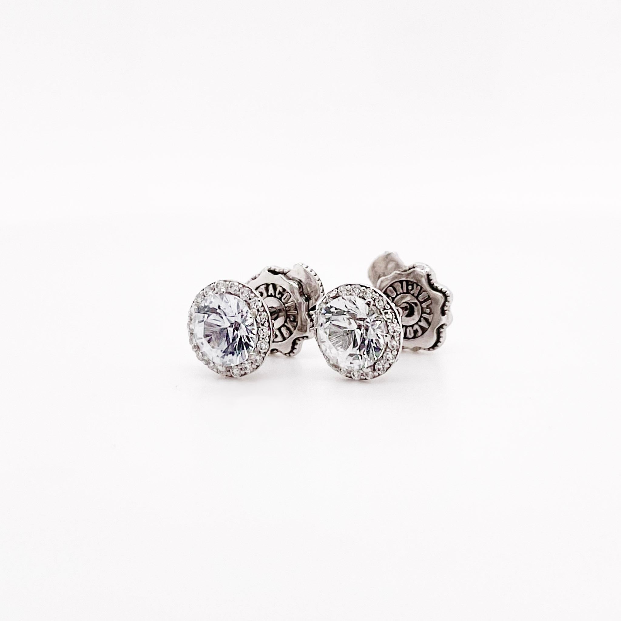 Stunning, Original Tacori Diamond Earrings w White Sapphire in the Center. This gorgeous piece is an original Tacori design with a genuine, natural white sapphire with a diamond halo. Tacori is known for their magnificent workmanship and quality of