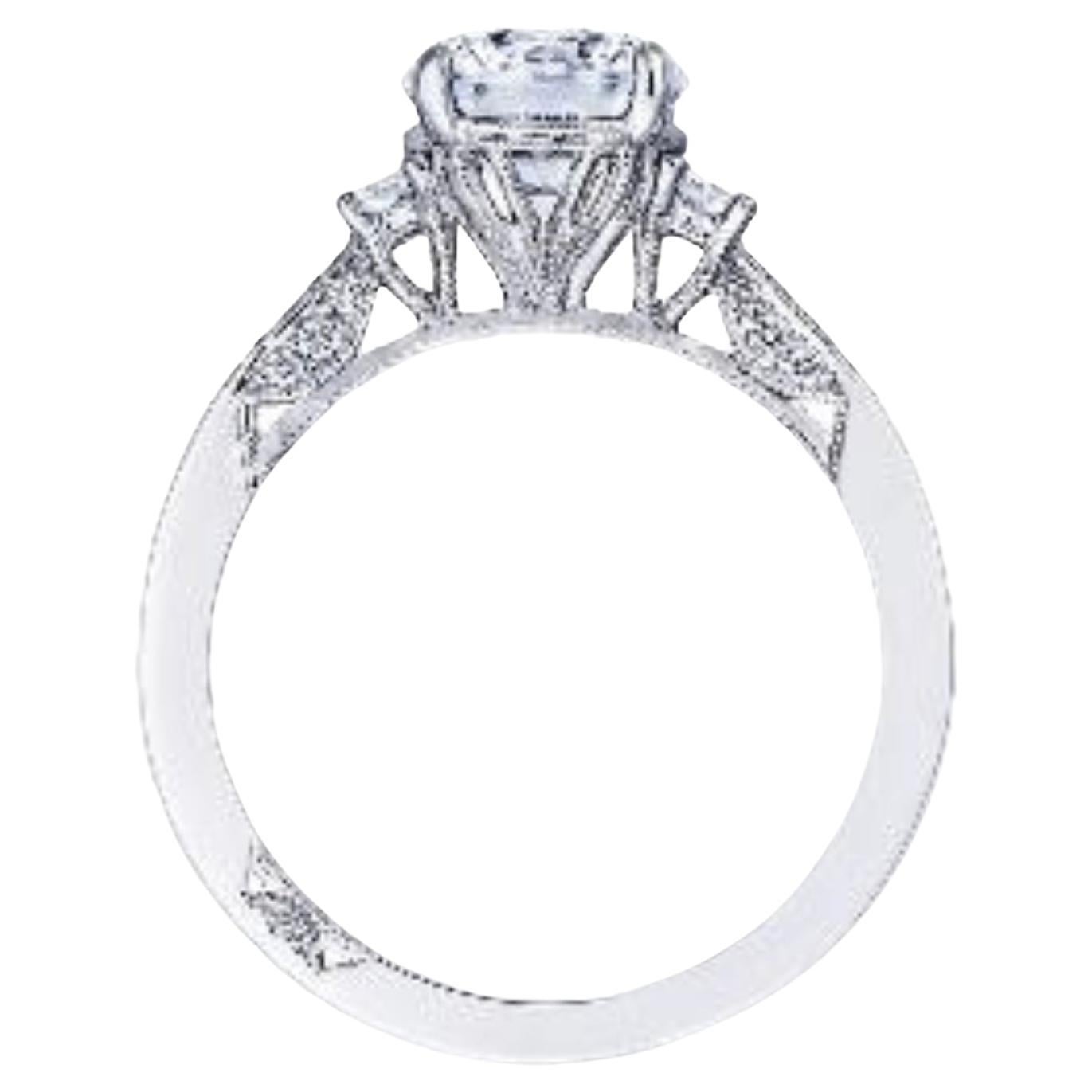 One 18-karat white gold Tacori diamond semi-mounting. This elegant picture-frame prong outlines your round center, which is further brought to life by two high-intensity cadillac side stones on a high polished band with pave diamond detailing. The