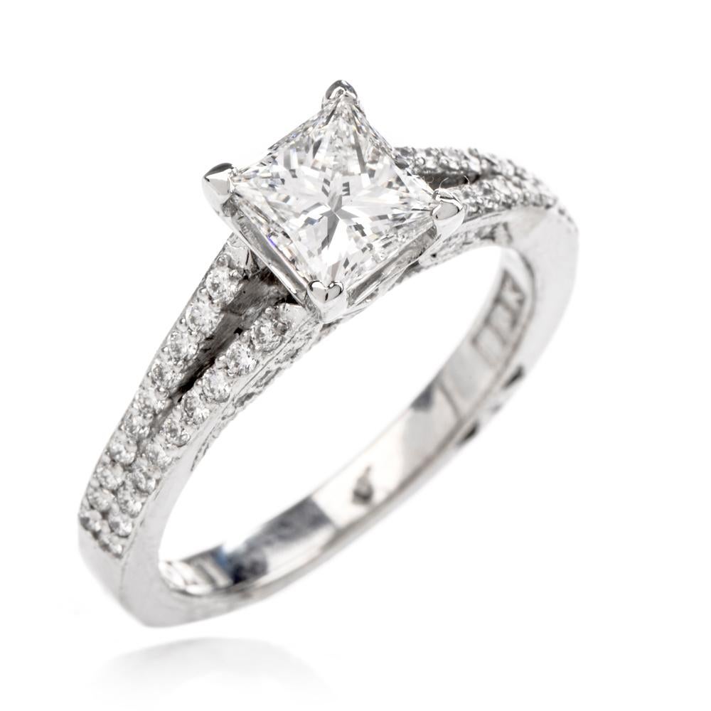  This stunning diamond engagement ring is crafted in solid platinum, weighing 5.8 grams and measuring 6mm x 7mm. Showcasing a GIA lab reported square modified brilliant, prong-set diamond weighing 1.00 carats, graded E color and VS1 clarity.