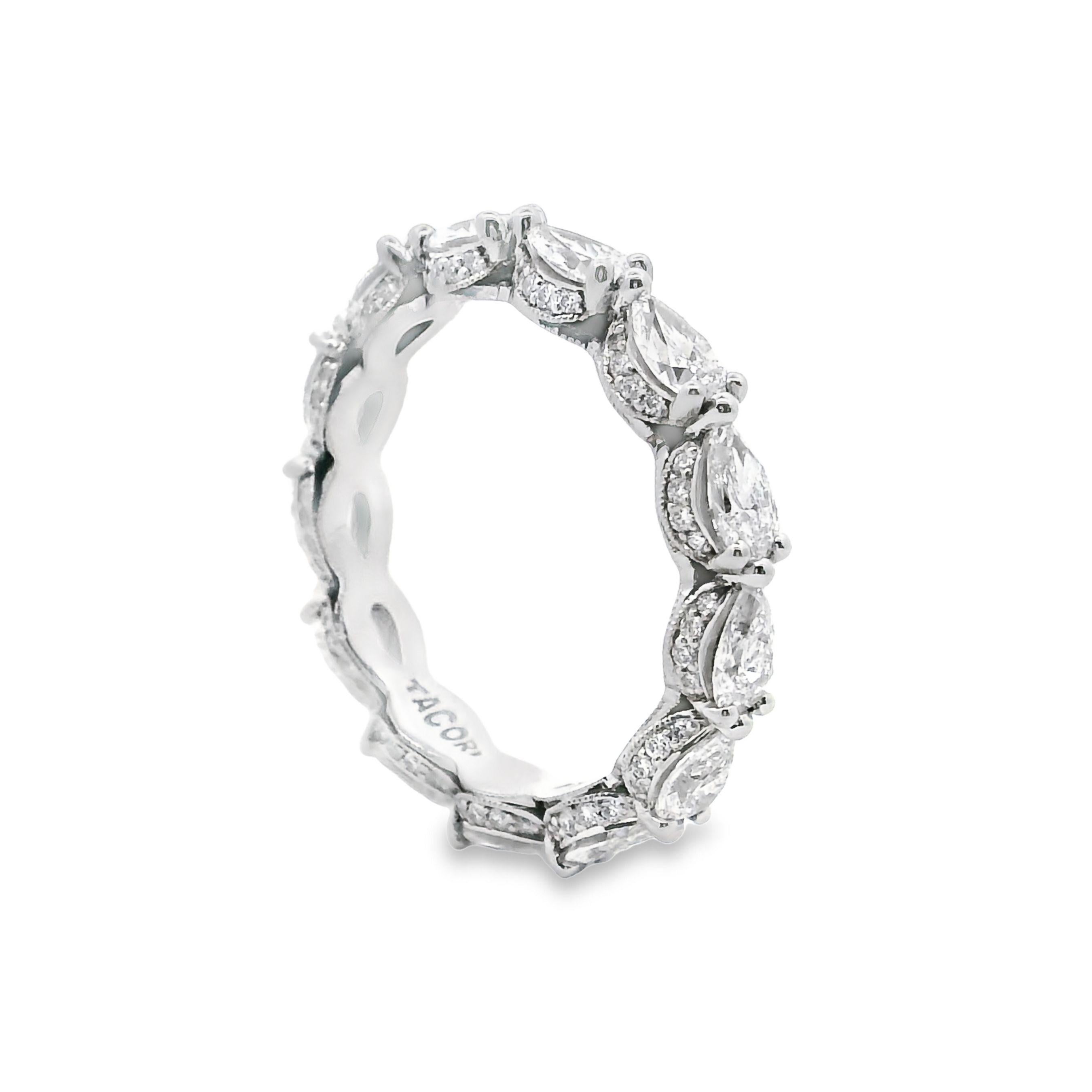 Tacori HT2642 platinum eternity band is part of the California designer's Royal T Collection.  This stunning band is hand engraved, has pear shaped diamonds all the way around, as well as smaller round diamonds throughout the ring.  Total diamond
