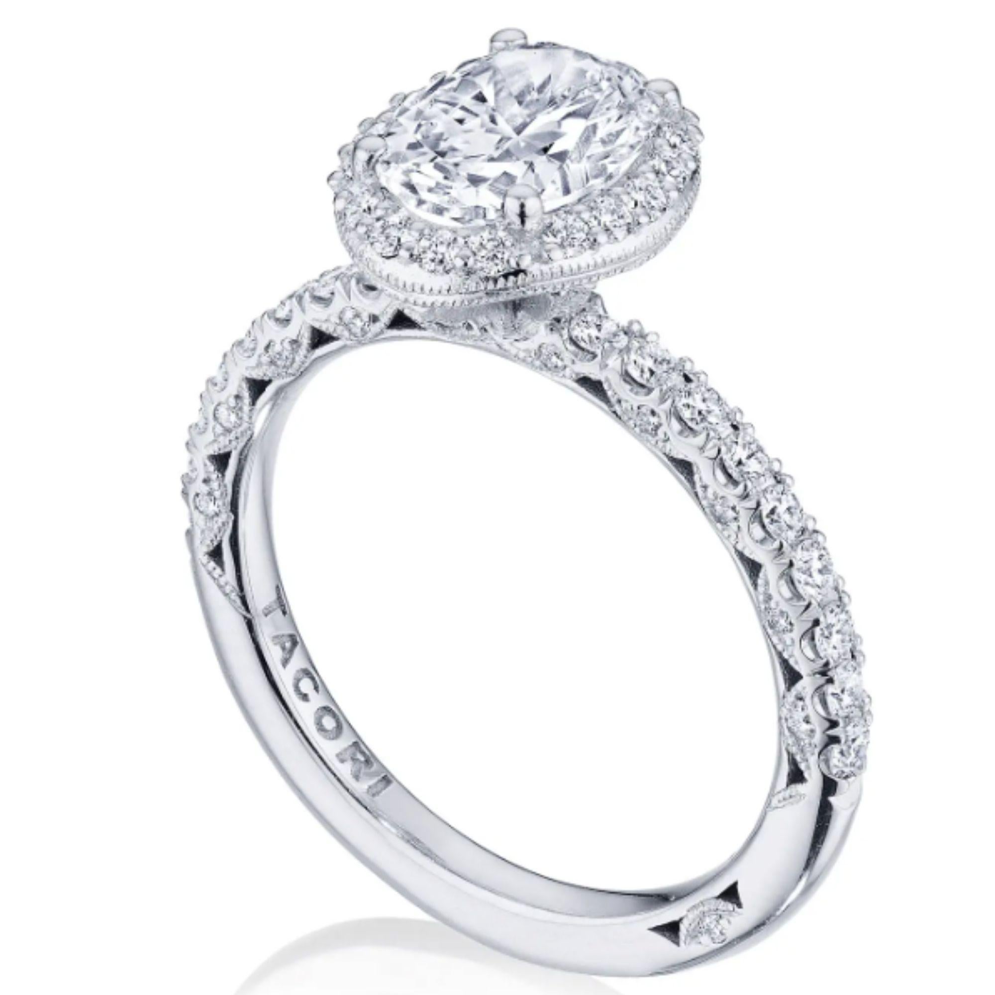 Born from Tacori's Petite Crescent collection and bringing an even brighter, bigger, more diamond intense bloom of diamonds, Tacori added a lace-like Dantela crown to bring your oval center diamond to life. The ring is set with eighteen (18) round