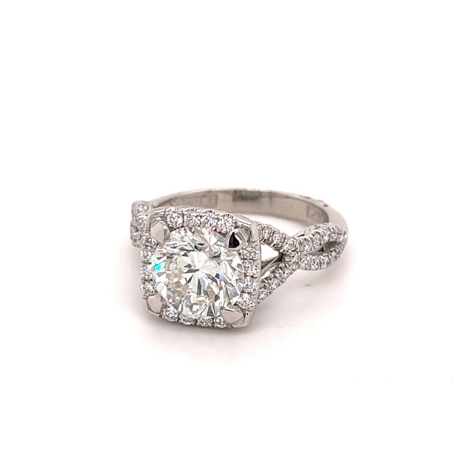 Tacori Platinum Round Center With Round Diamond Ring  

Size 6.75

8.1 Grams

 Round Brilliant Cut White Diamonds .75 Carats Total Weight

Clarity: Si1 Color: H

Center Round Brilliant Cut Diamond 2.37 Carats

Color: H Clarity: Si2



This is a