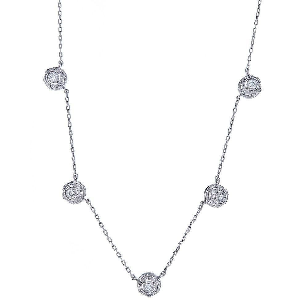 This finely executed Tacori necklace comes set in platinum and diamonds.