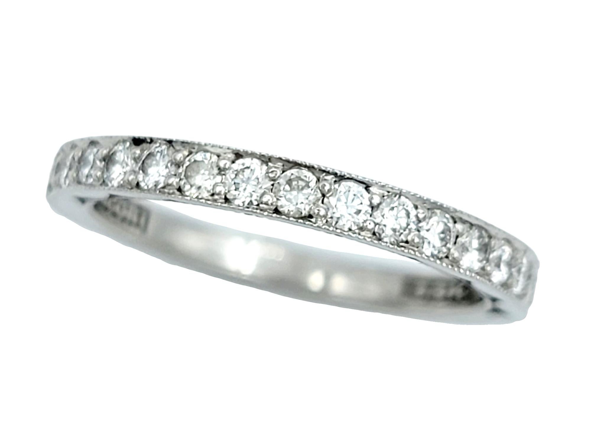 Ring Size: 4

The Tacori Sculpted Crescent band ring is a delicate and elegant piece, crafted in radiant 18-karat white gold. Perfectly designed for versatility, this ring serves as a stunning addition to a stack of rings or as an enchanting wedding