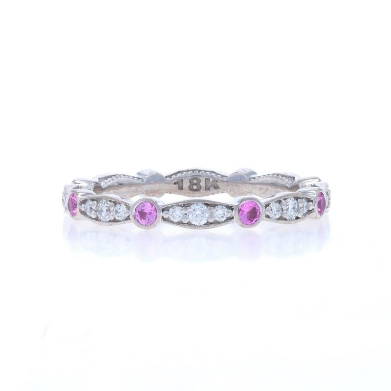Retail Price: $2790

Size: 5 1/2

Brand: Tacori
Collection: Sculpted Crescent

Metal Content: 18k White Gold

Stone Information

Natural Sapphires
Treatment: Heating
Carat(s): .24ctw
Cut: Round
Color: Pink

Natural Diamonds
Carat(s): .30ctw
Cut:
