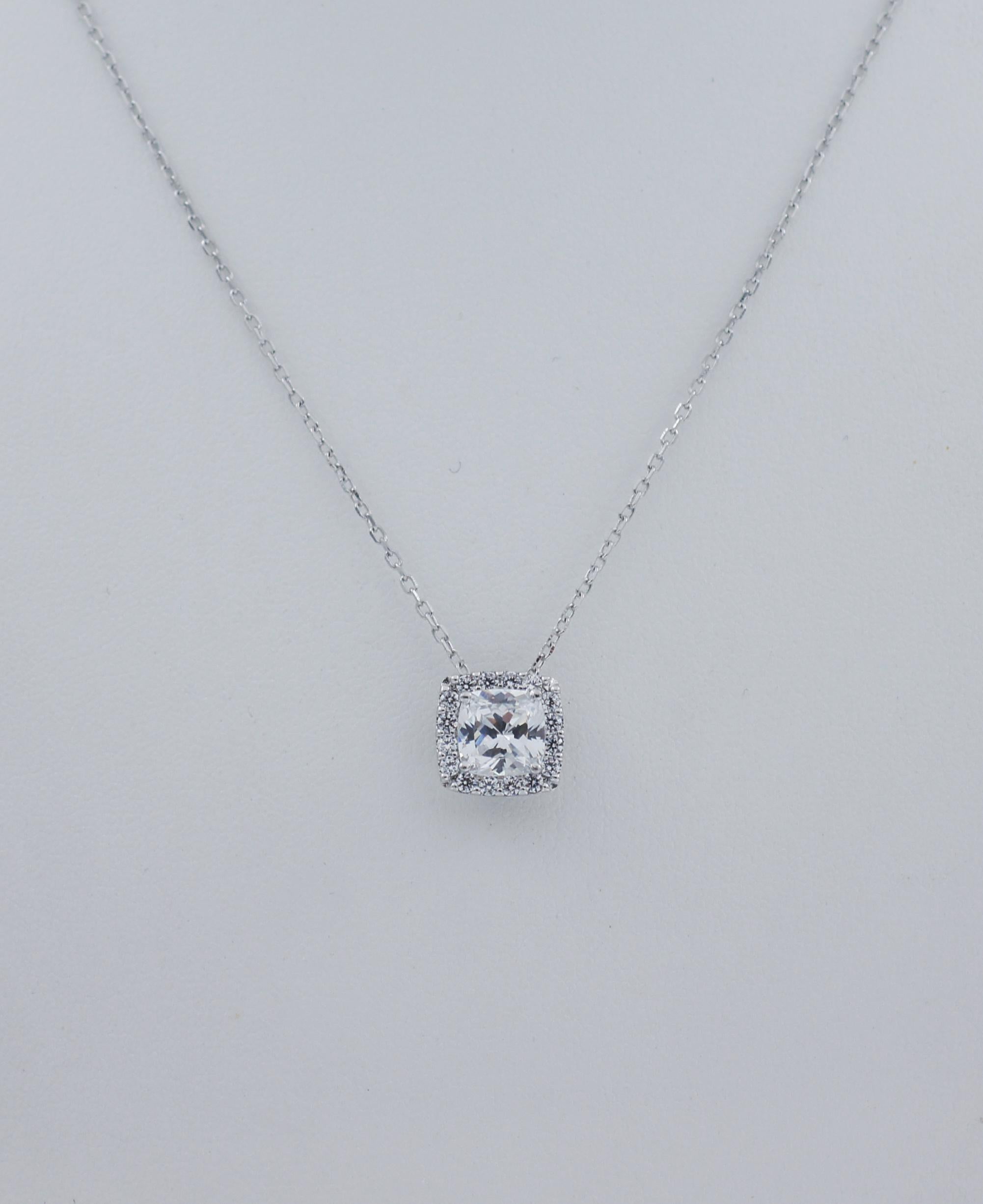 Tacori 
Sterling Silver 925 
CZ Epiphany Necklace
The necklace is crafted of sterling silver and fastens with a spring ring clasp.
Brand: Tacori
Color: White
Stone: Cubic zirconia
Largest stone approx. measurements: 8 mm wide x 8 mm long
Metal: