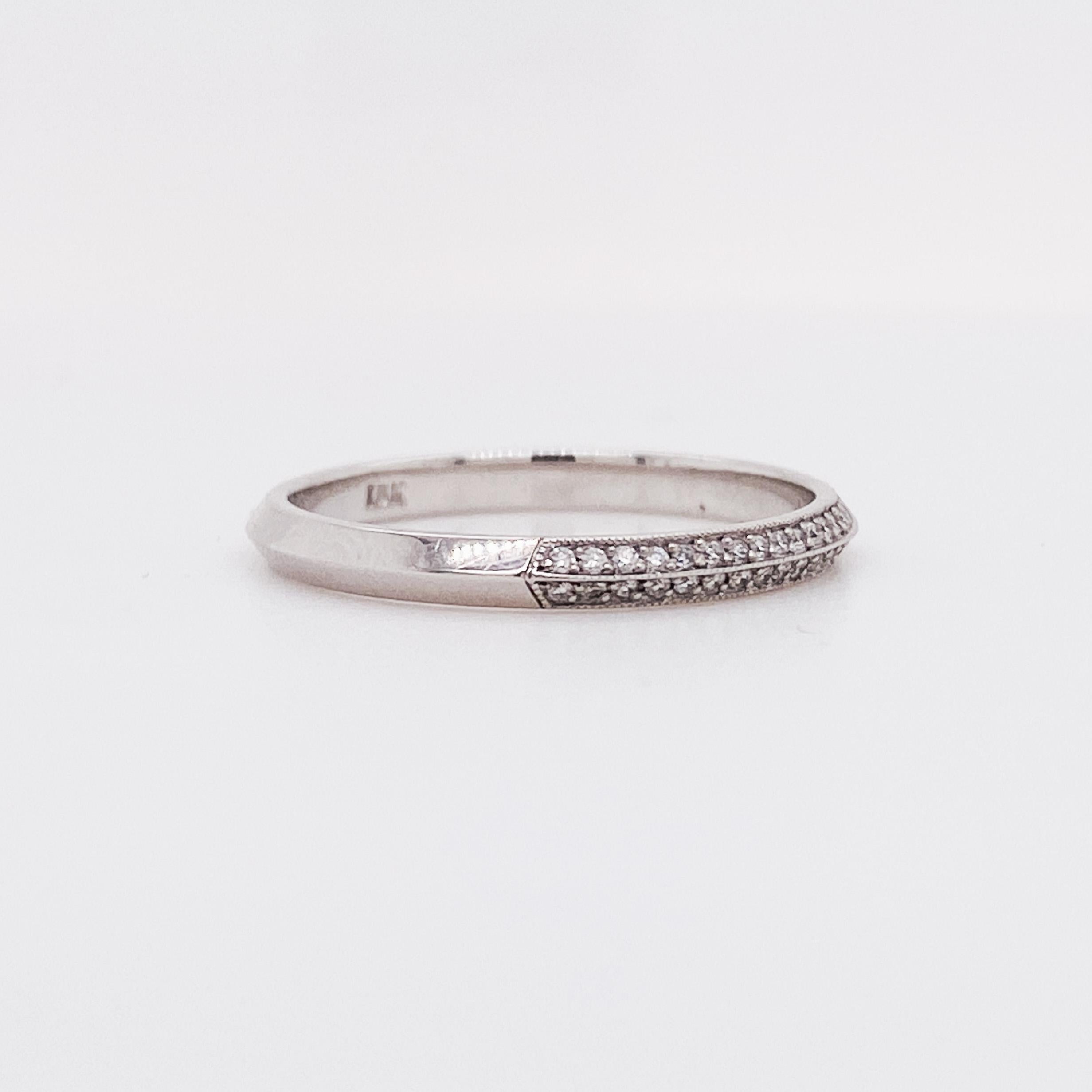 This Tacori Brand ring is a gorgeously bright knife edge band has a double row of diamonds at the top with crisp geometric shape frames. A milgrain textured edge accents the frames around the diamonds. Slender and easy to wear, the band is only 1.5