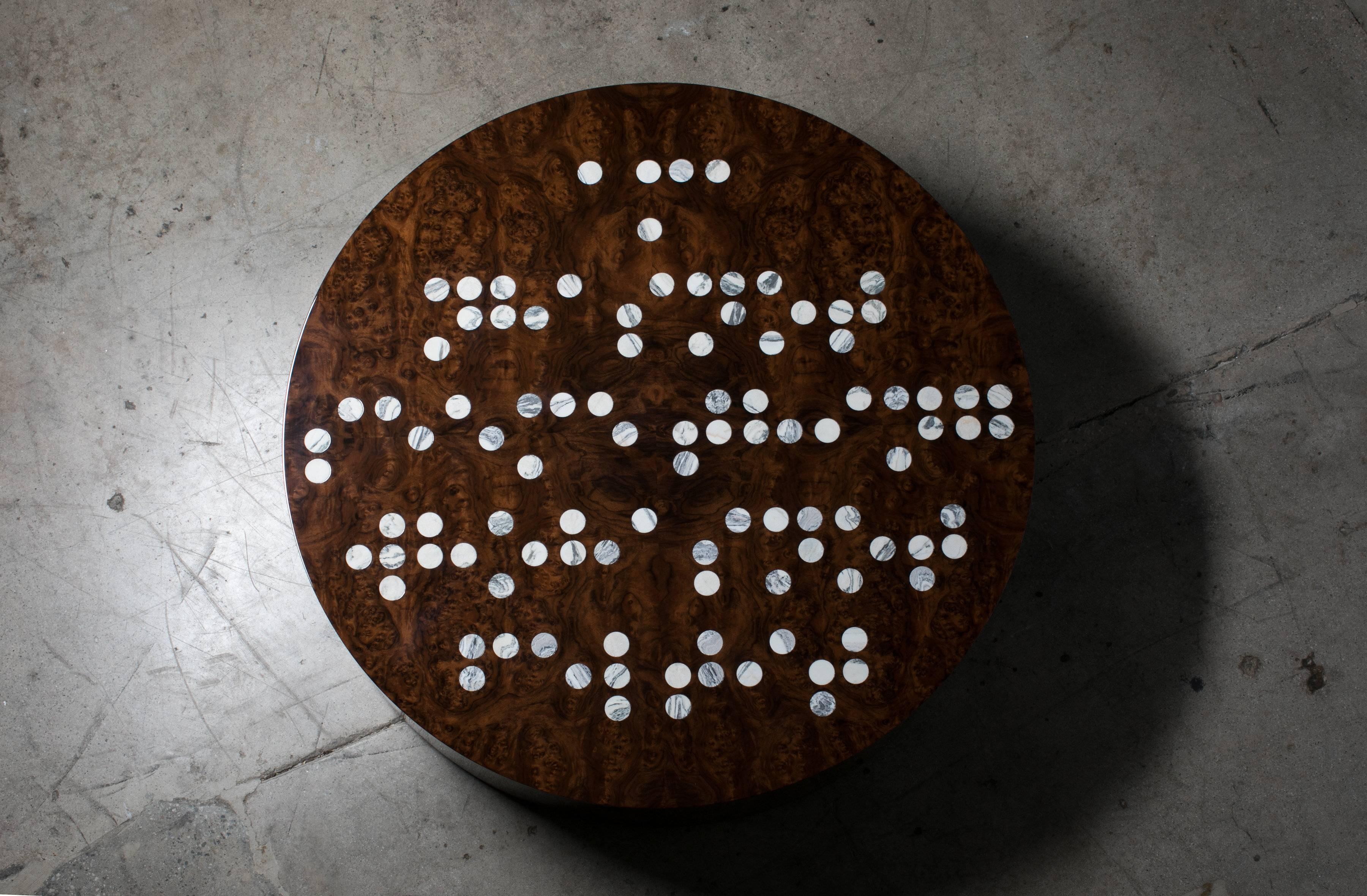 Inspired by the role of touch in visual processing, Taction is a one-of-a-kind table with a quote from Henry David Thoreau: 