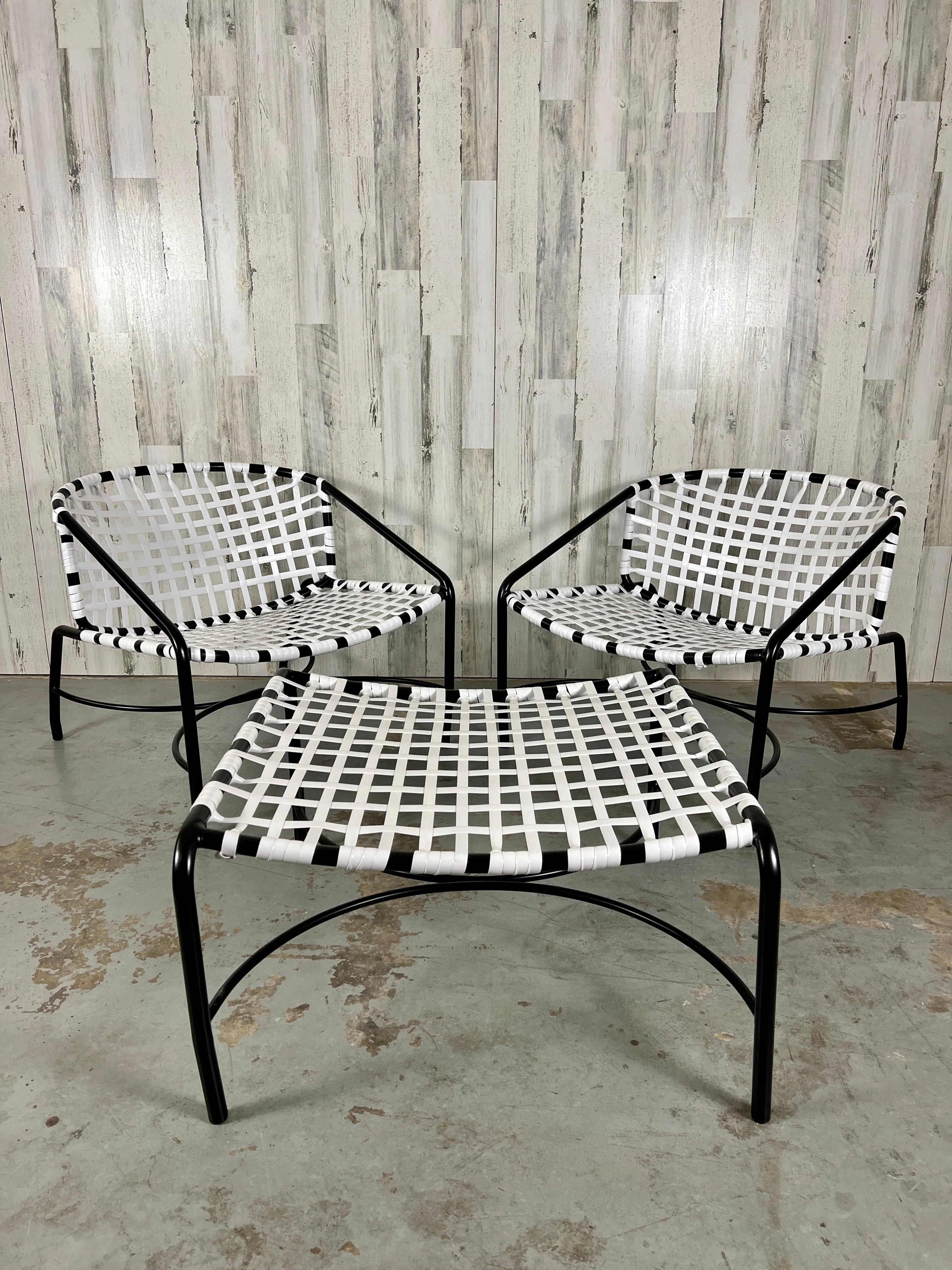 Vintage pair of Tadao Inouye for Brown Jordan Kantan lounge chairs and one ottoman. Fully restored with new black powder coat on the frame and contrasting white strapping. 
Ottoman measures: 26 wide 25.5 deep 14.75 tall.