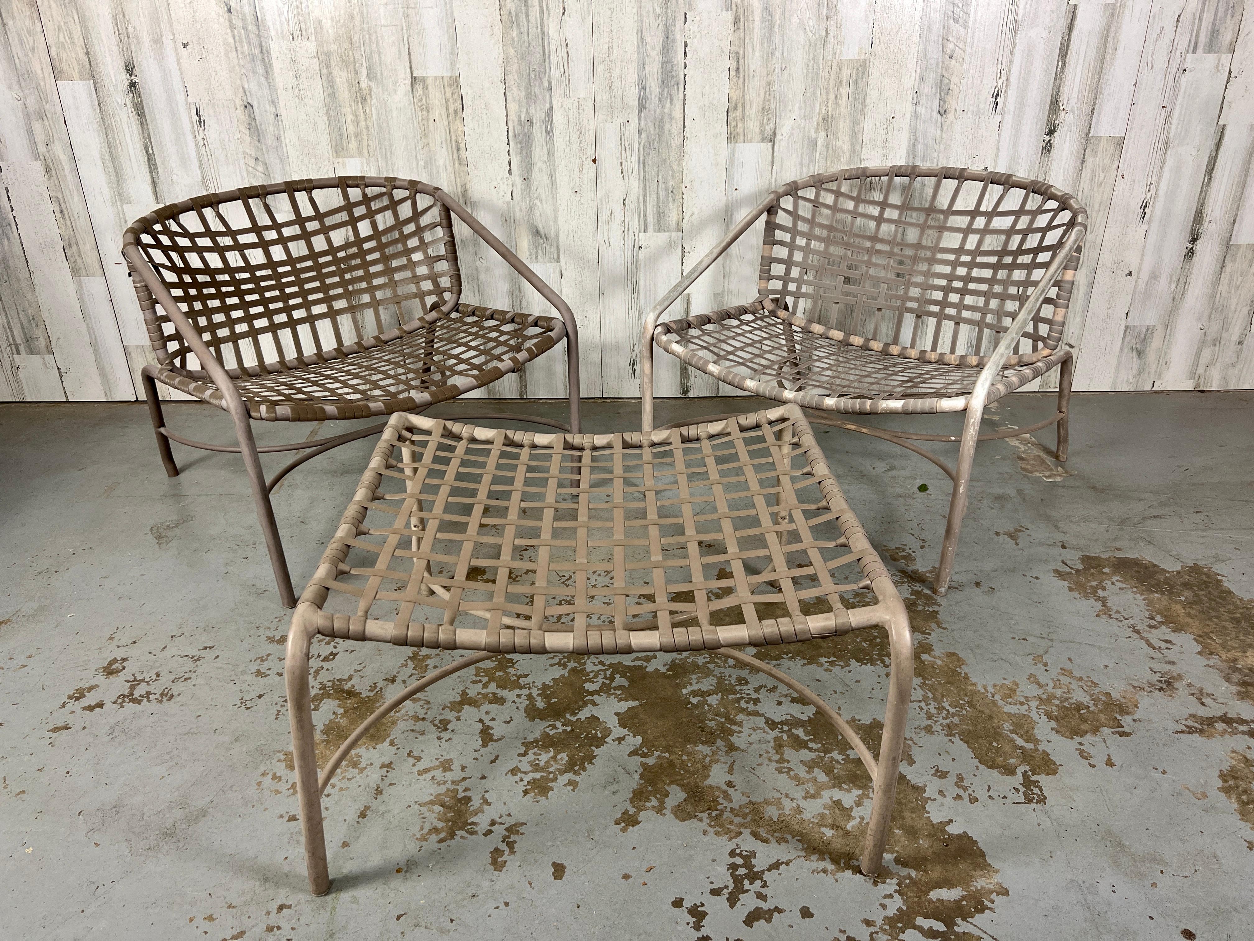 Tadao Inouye designed for Brown Jordan Kantan Set of Patio Chairs with Ottoman. The chair straps are in good condition. While the entire set is functional, you might consider having it re-powder coated and strapped for a refreshed look.
Ottoman
