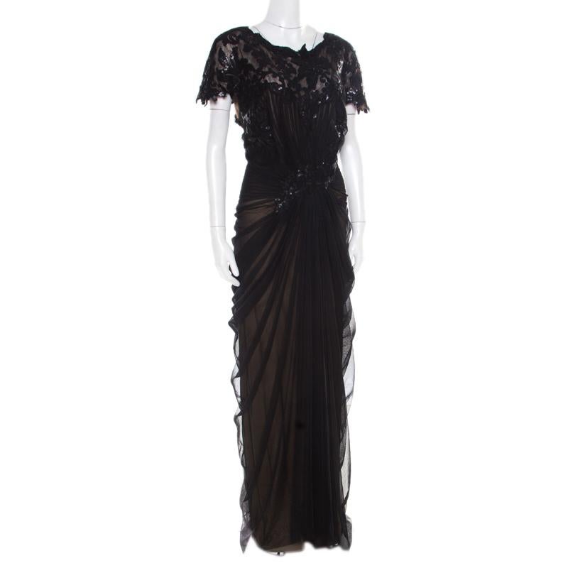 Get set to rock that special evening and make a style statement like never before in this gorgeous evening gown from Tadashi Shoji! The black creation is made of 100% polyester and features a gathered silhouette. It flaunts sequins embellished on