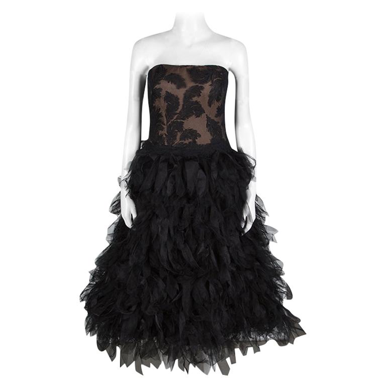 monique lhuillier black tulle dress with feathers