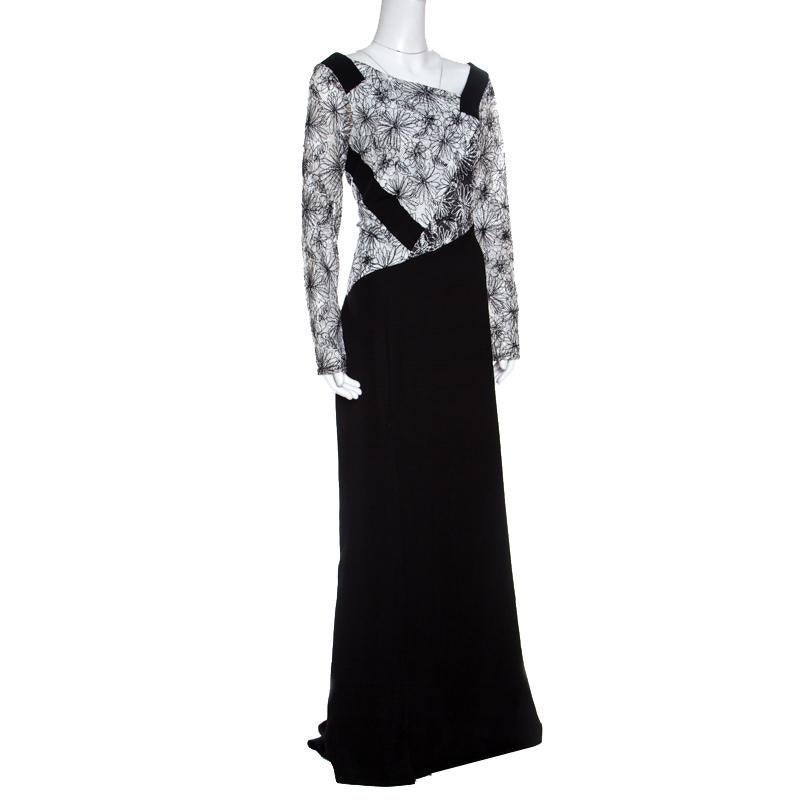 Attend formal parties with an impressive gown like this one in blended fabric. Flawless for all seasons, this one in monochrome will be a favorite. Express your love for contemporary fashion by donning this extravagant floral embroidered gown from