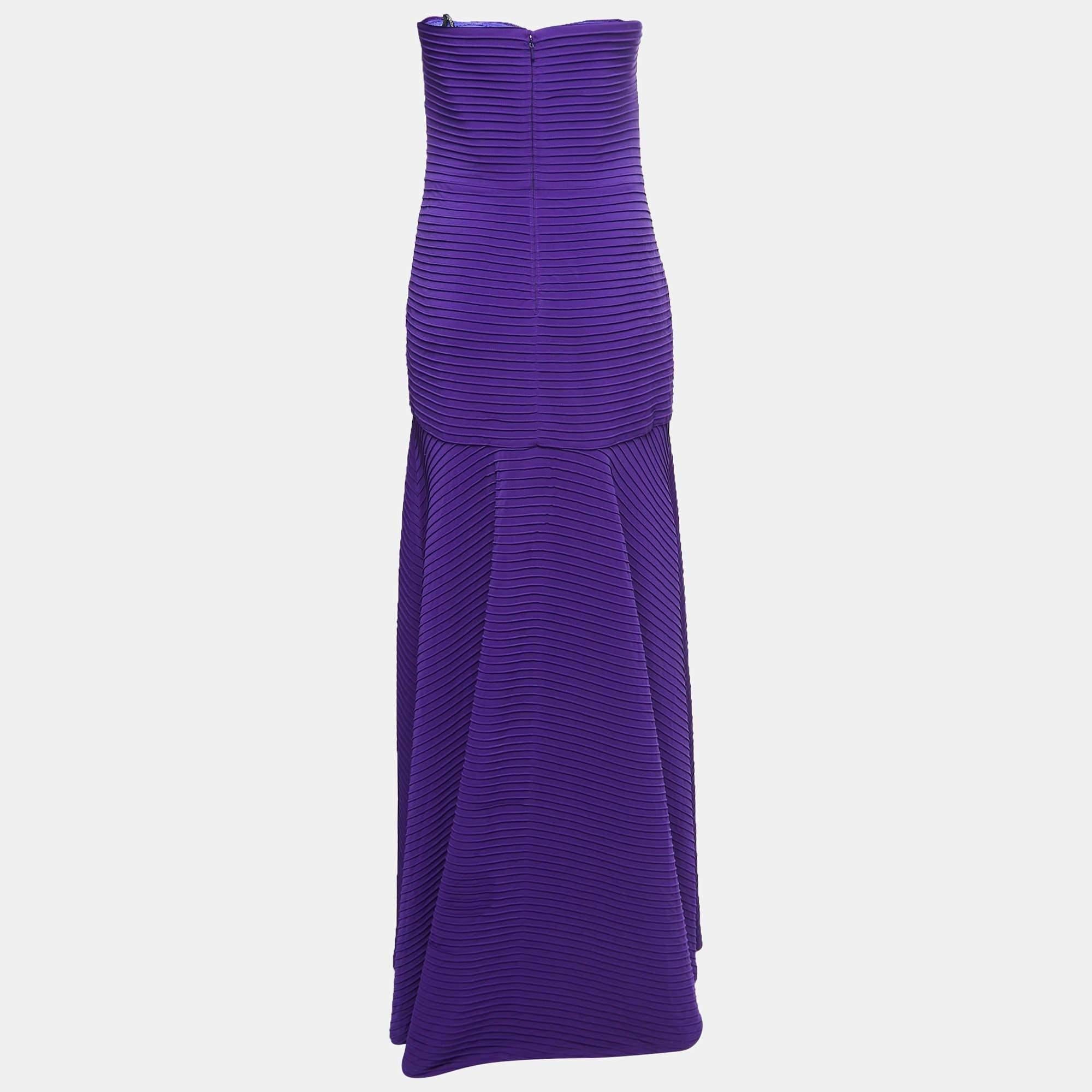 Resplendent elegant and gorgeous this gown defines it all. Flaunting a floor length silhouette this gown is beautified using stunning details and a stylish neckline. Wear it with statement accessories and a defining clutch.