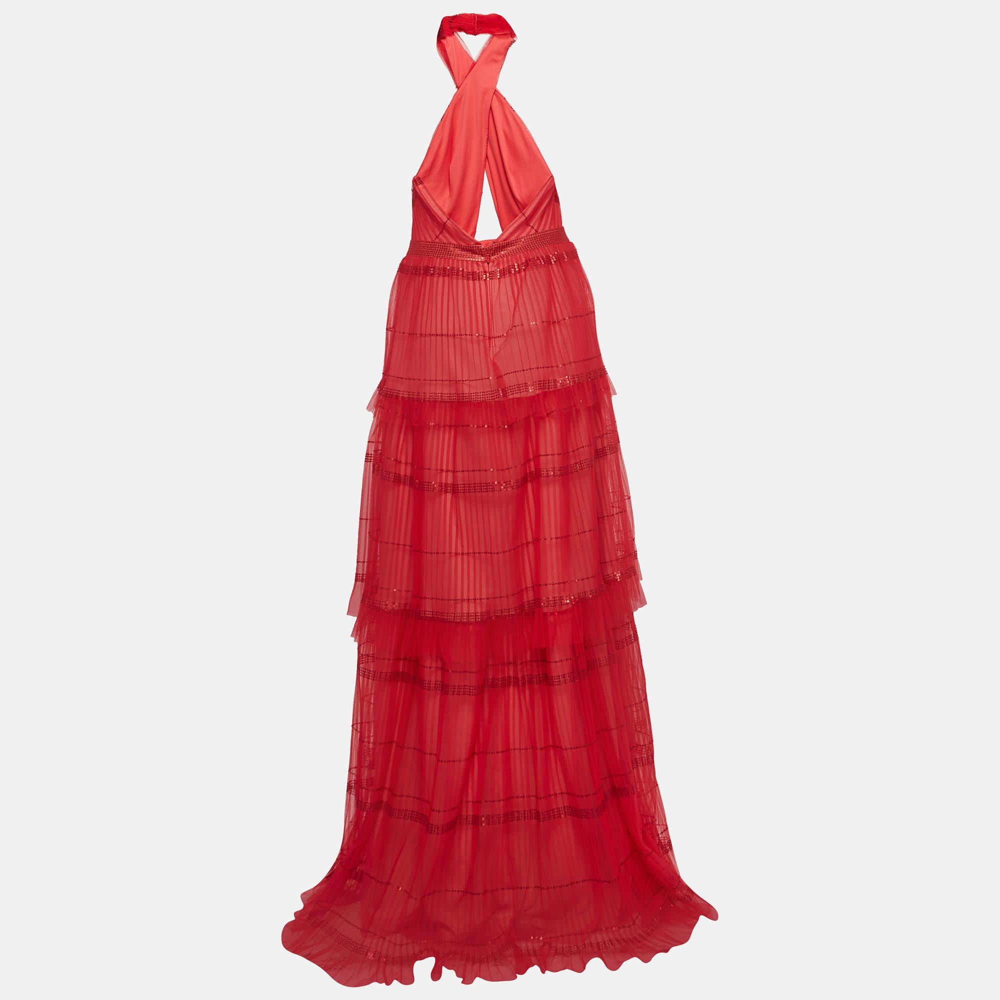 Resplendent  elegant  and gorgeous  this gown defines it all. Flaunting a floor length silhouette  this gown is beautified using stunning details and a stylish neckline. Wear it with statement accessories and a defining clutch.