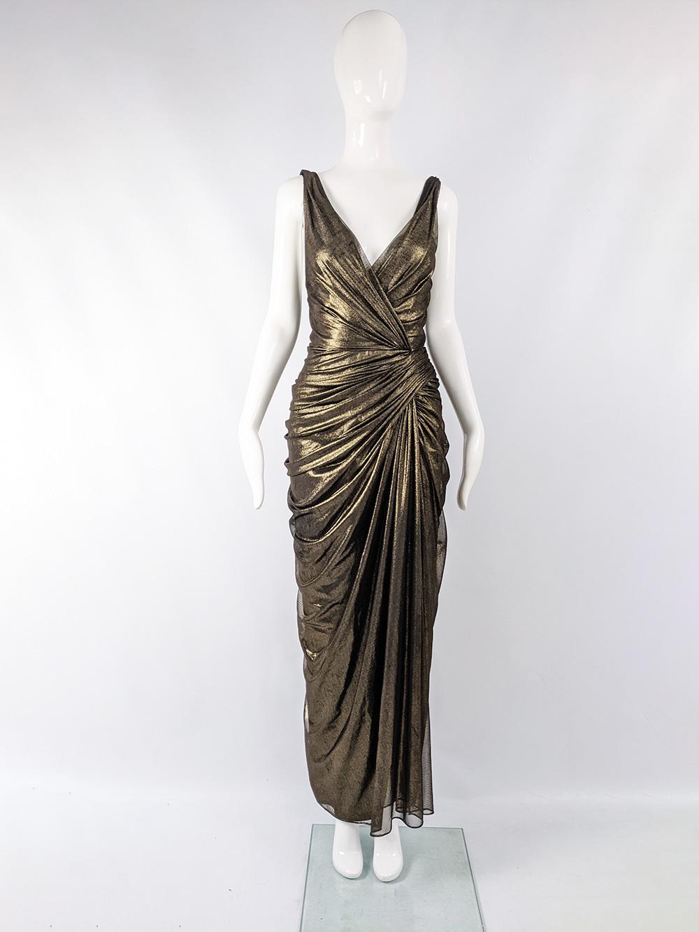 A stunning vintage sleeveless evening gown from the late 80s / early 90s by luxury American-Japanese designer, Tadashi Shoji. In a black and gold mesh fabric with beautiful draping and gathering crossing over at the hips. The rear has a sexy