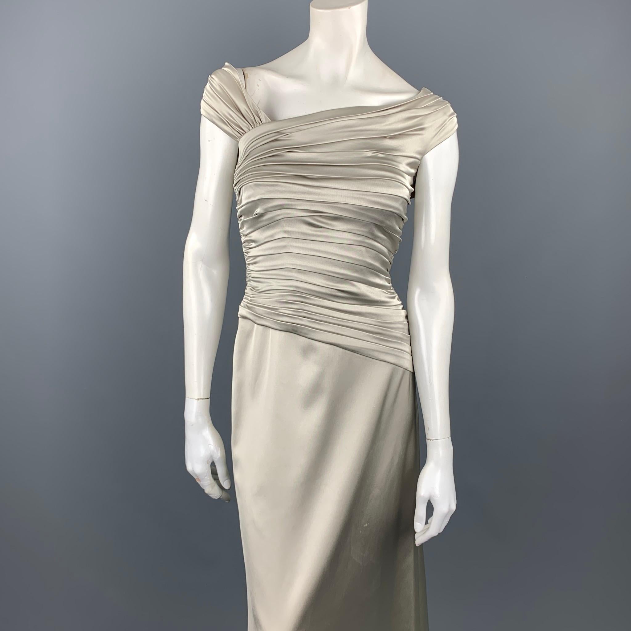 TADASHI evening gown comes in a silver satin acetate blend featuring a ruched bodice style, sleeveless, and a back zip up closure. Minor wear & discoloration throughout. As-Is. Made in USA.

Fair Pre-Owned Condition.
Marked: UK