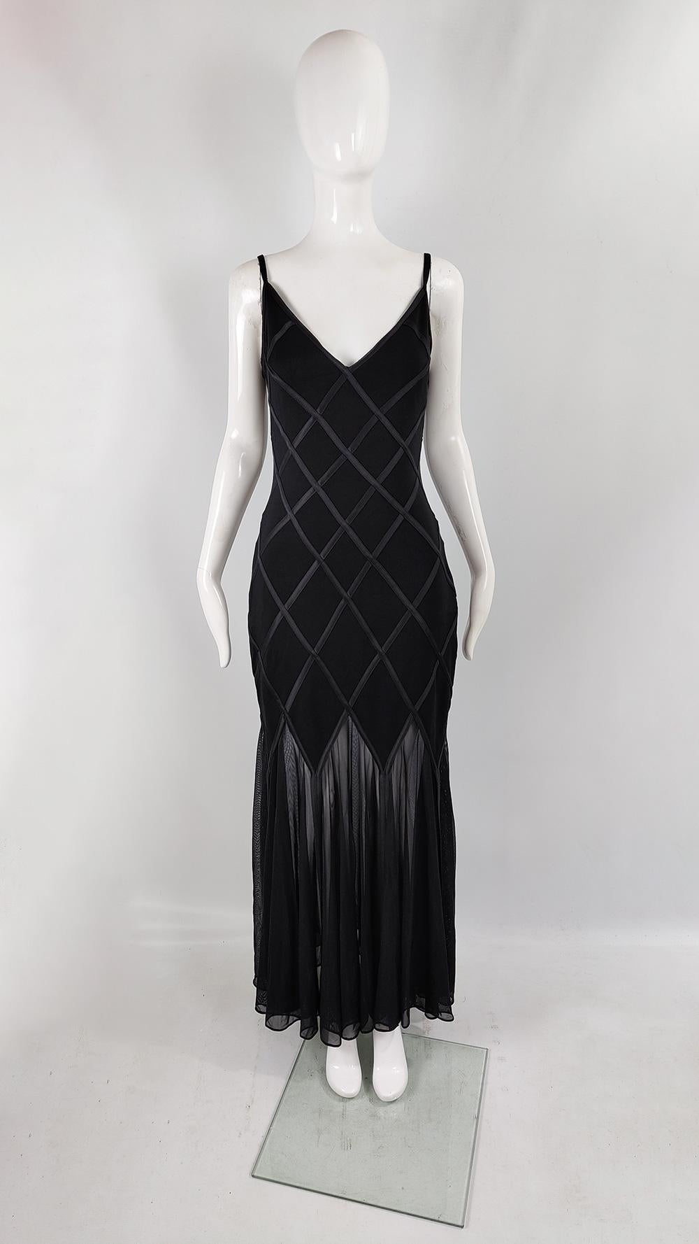 A super sexy vintage evening gown from the 90s by luxury American- Japanese fashion designer, Tadashi Shoji. It has a black jersey dress on top with satin appliques creating a diamond pattern, a plunging back and a maxi length sheer mesh skirt at