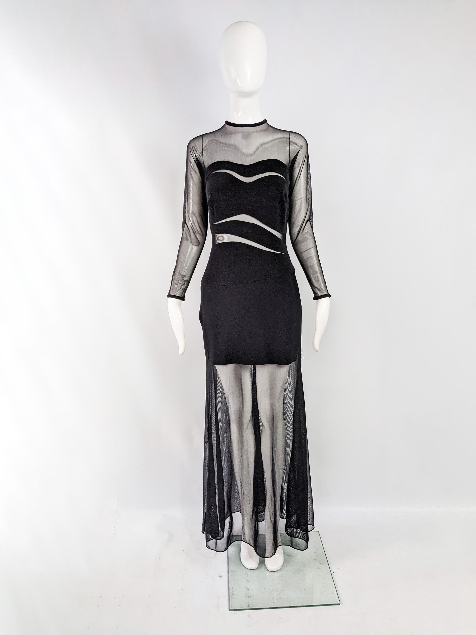 A stunning vintage long sleeve evening gown from the 90s by luxury American- Japanese fashion designer, Tadashi Shoji. In a black bandage material with cut outs and a sheer mesh overlay. 

Size: Marked L but measures like a UK 10-12/ US 6-8. Please