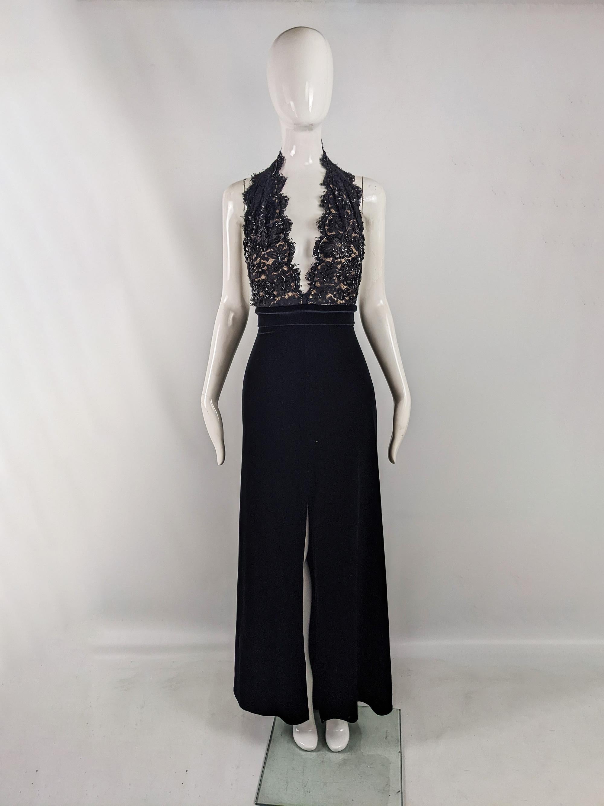 A glamorous vintage evening gown from the 90s by luxury fashion designer, Tadashi Shoji. In a black velour with a nude top and black lace overlay. It has a sexy deep plunging neckline and beautiful beading smattered on the lace top. There is a deep