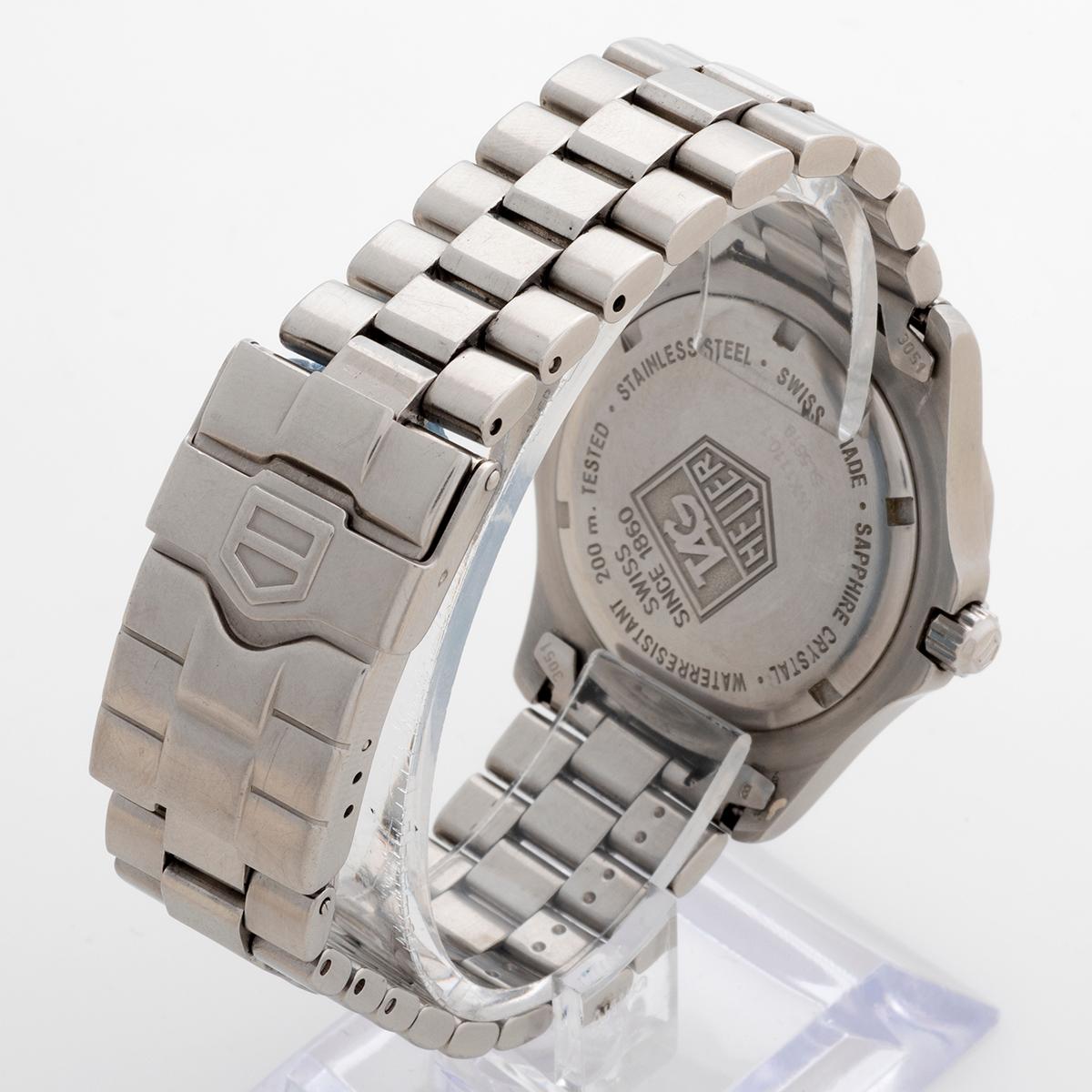 Femenino o masculino Profesional de cuarzo Tag Heuer 2000 ref WK1110-1, esfera negra, caja de 39 mm, año 2000.