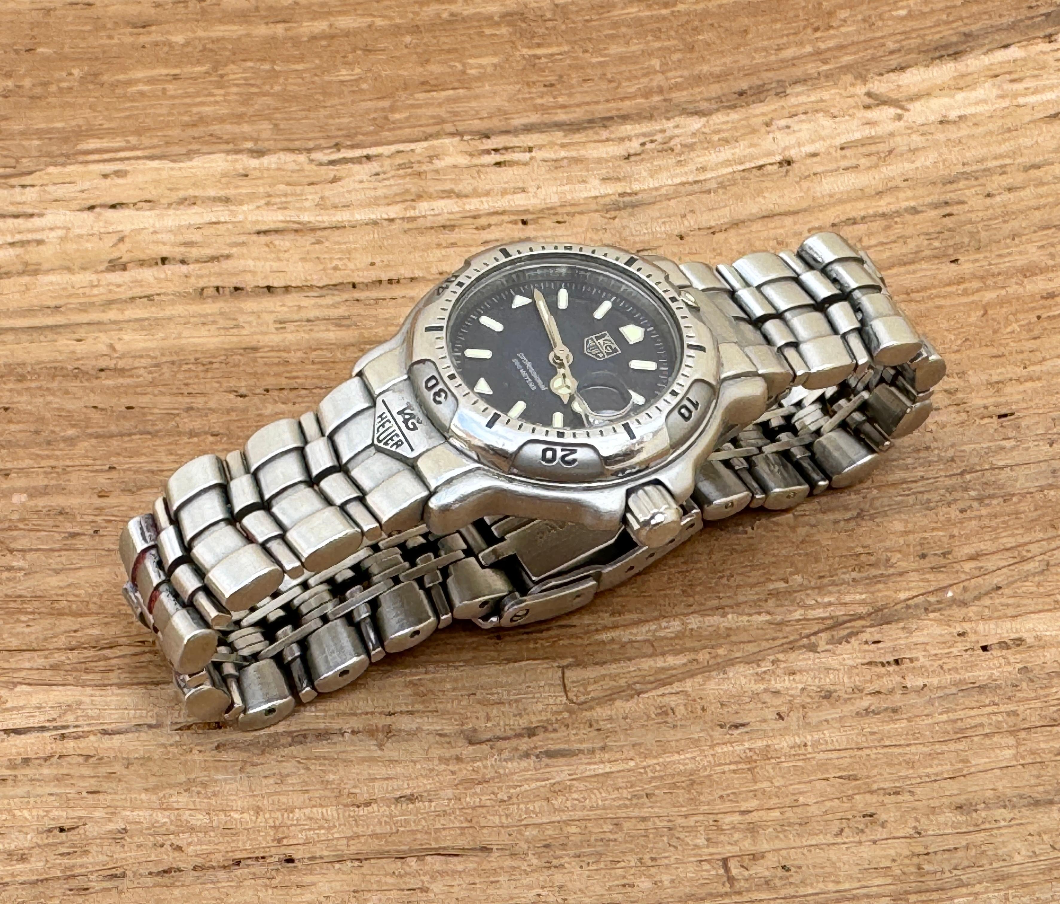  Description
Brand: TAG Heuer

Model: Professional

Reference Number: Wh1315-K1

Country Of Manufacture: Switzerland

Movement: Quartz

Case Material: Stainless steel

Measurements : Case width: 28 mm. (without crown)

Band Type : Stainless