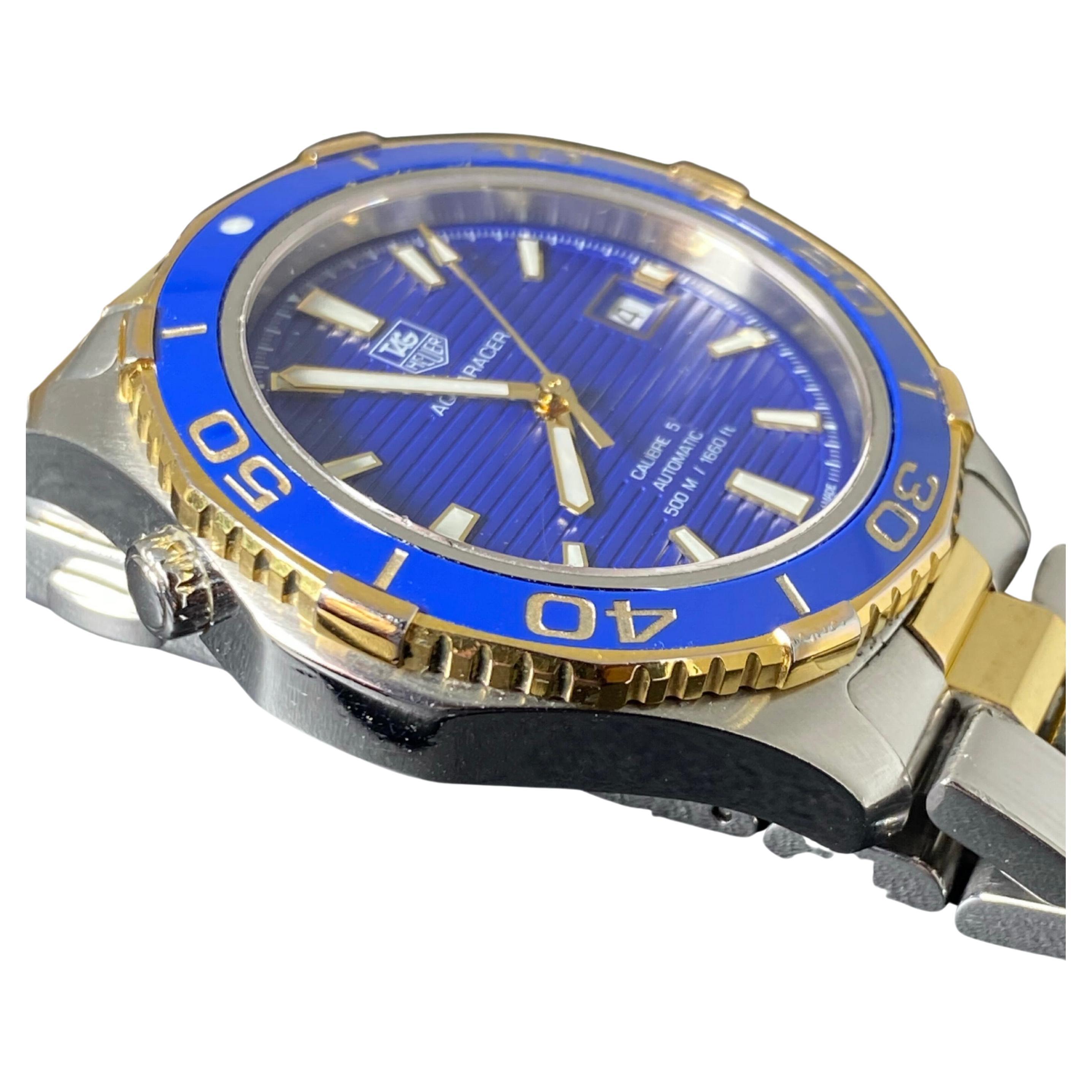 Rarely seen Tag Heuer Aquaracer dates from circa 2014, 
yet it's in great condition & in excellent working order

~~~

41mm Stainless Steel Case is waterproof 500m, 
featuring a gold-plated & blue ceramic bezel
adorned by gold-plated winder & the