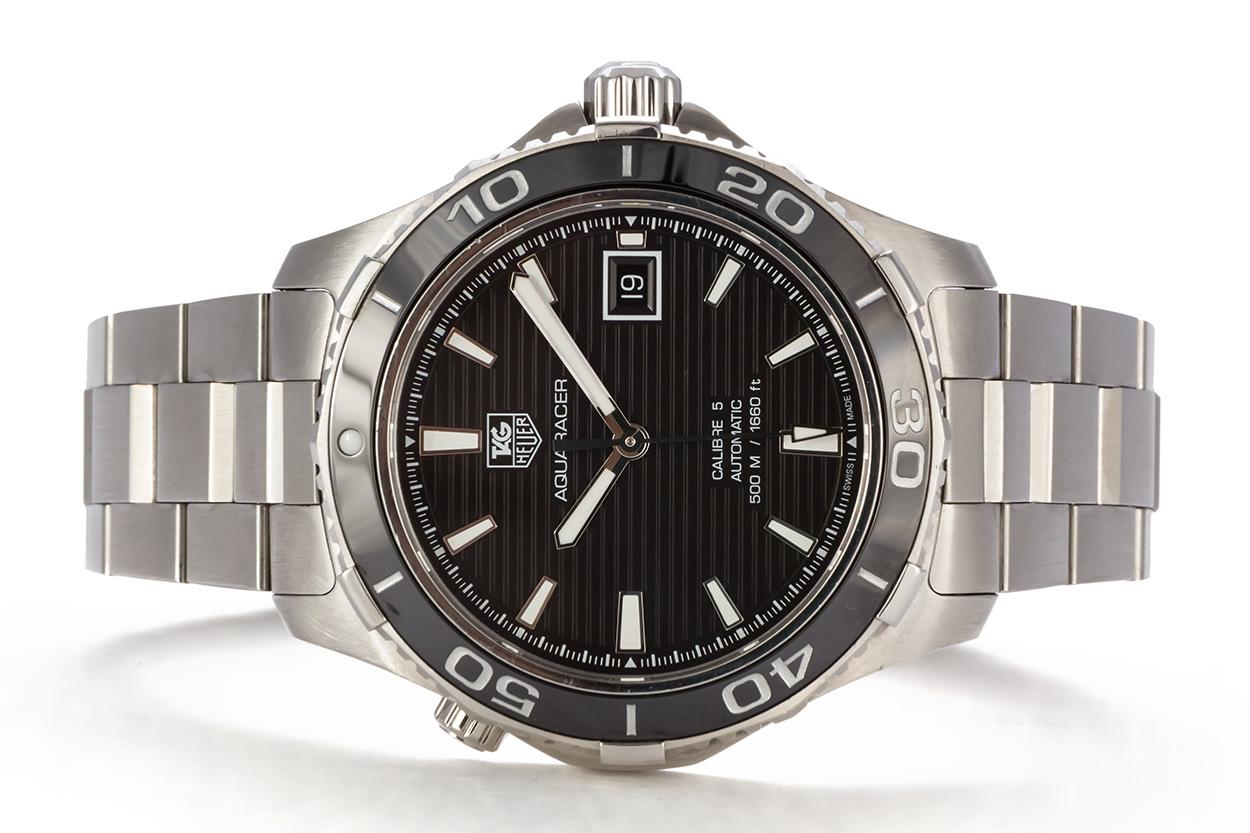 We are pleased to offer this TAG Heuer Aquaracer 500m Stainless Steel Automatic Mens Watch WAK2110. This watch features a stainless steel 41mm case, black ribbed dial with date aperture, 3-link bracelet and uni-directional rotating stainless steel