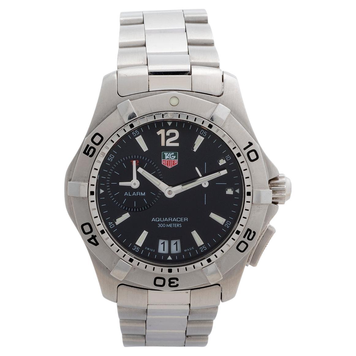 Our Tag Heuer Aquaracer Alarm , reference WAF111Z , is presented in excellent condition with some light signs of use from new, and unpolished. This reference is powered by a quartz movement and has an alarm function. The 40mm steel case features a